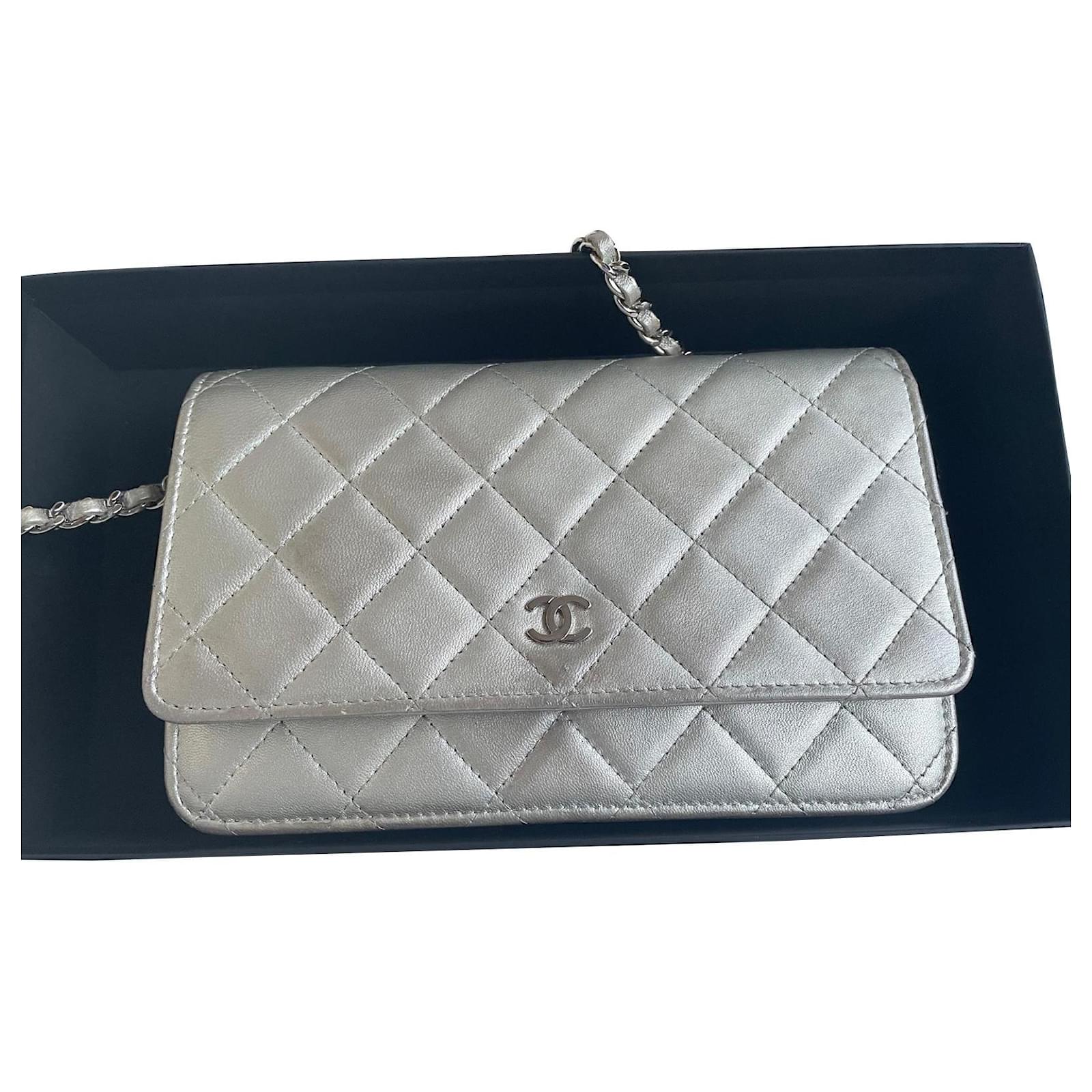Chanel wallet on chain bag in metallic gray leather.