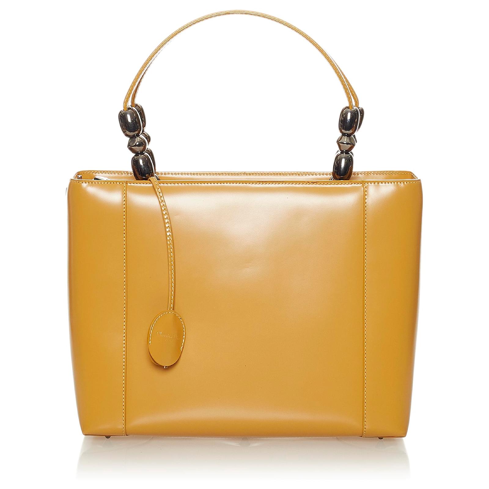 Cartella Dior in pelle marrone perla Malice Beige Vitello simile a un  vitello ref.445421 - Joli Closet