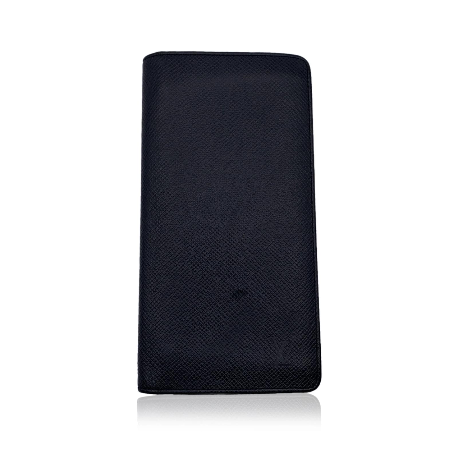 Louis Vuitton 2010 Taiga Leather Bifold Wallet - Black Wallets