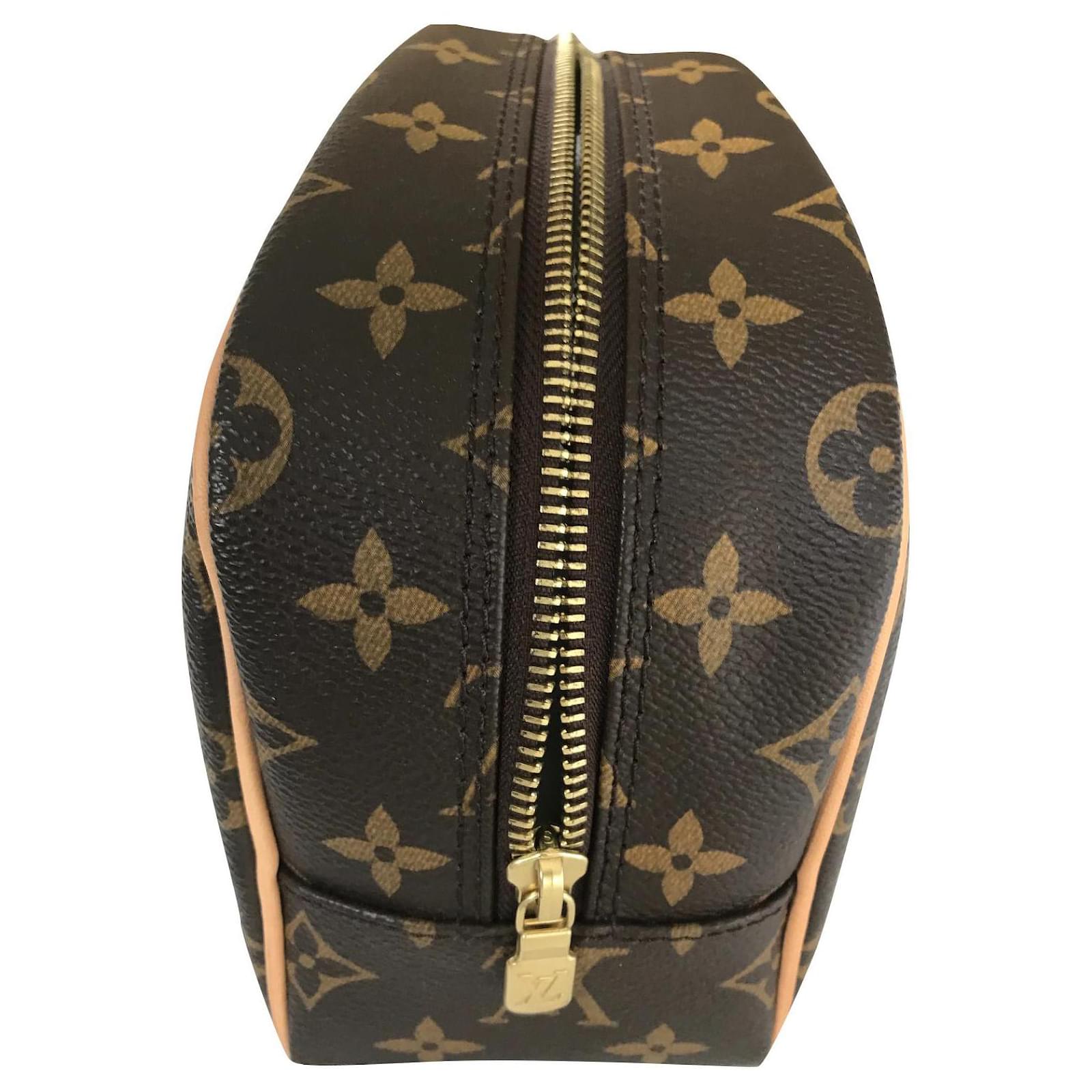 Braune Louis Vuitton Geldbörse aus beschichtetem Segeltuch Leinwand  ref.668625 - Joli Closet