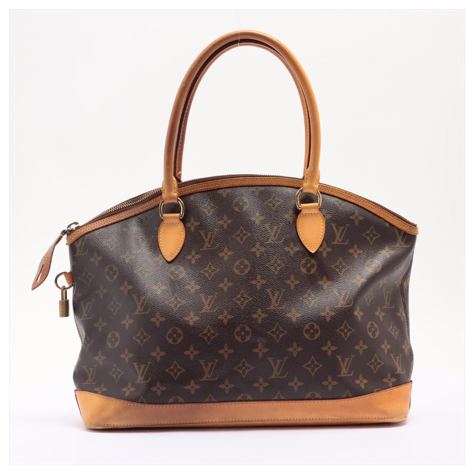 Used Louis Vuitton Lockit Handbags - Joli Closet