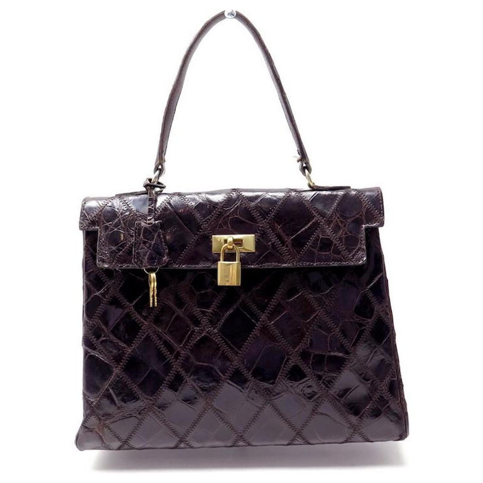 Autre Marque BORSA A MANO TIPO KELLY VINTAGE IN PELLE DI COCCODRILLO BORDEAUX BORSA A MANO IN PELLE DI COCCODRILLO Bordo ref.476723 Joli Closet