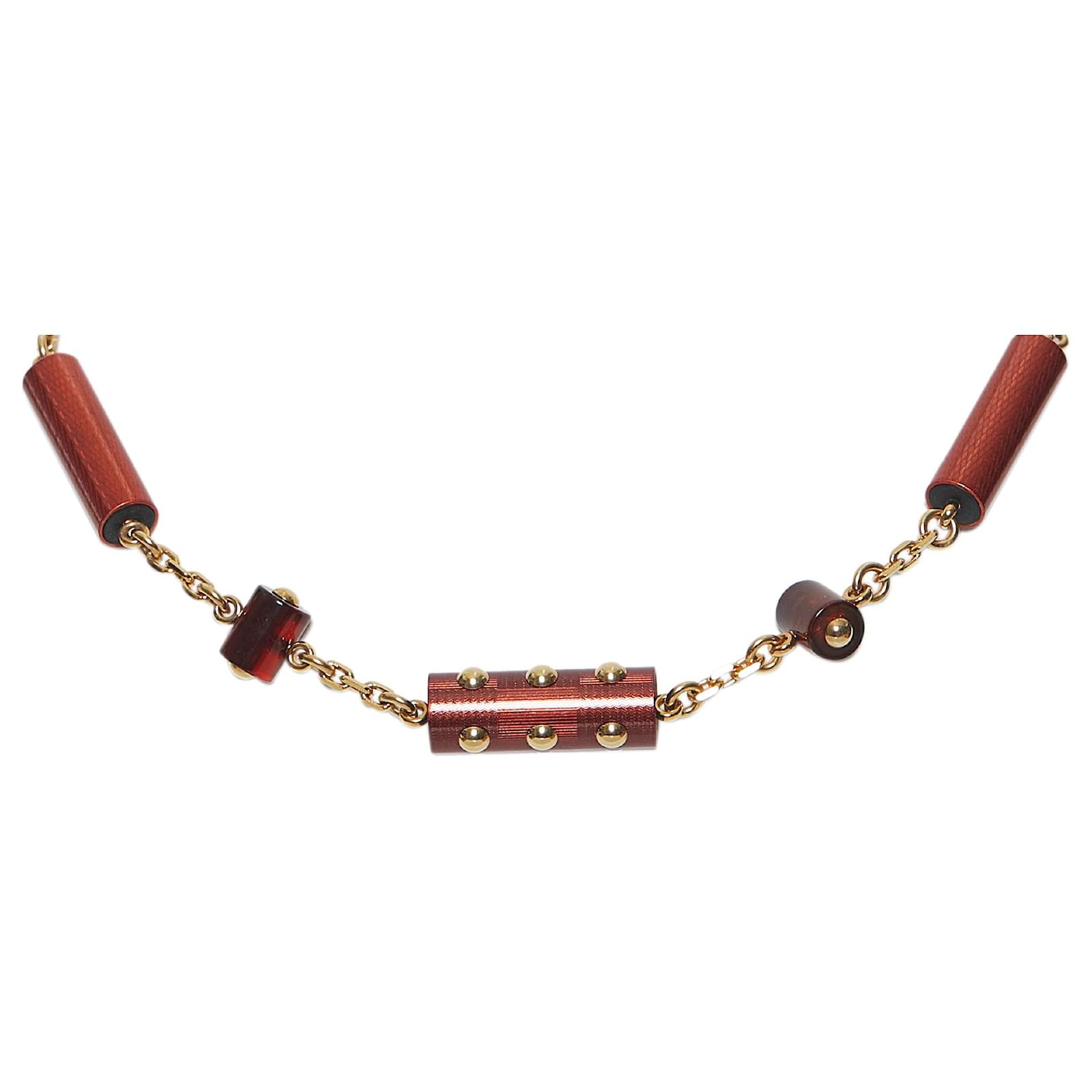 Louis Vuitton Red Resin Circus Signature Necklace Golden Metal Plastic  ref.476918 - Joli Closet
