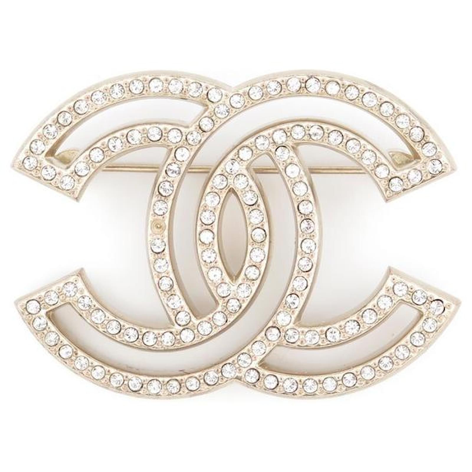 Broche Chanel doré/strass