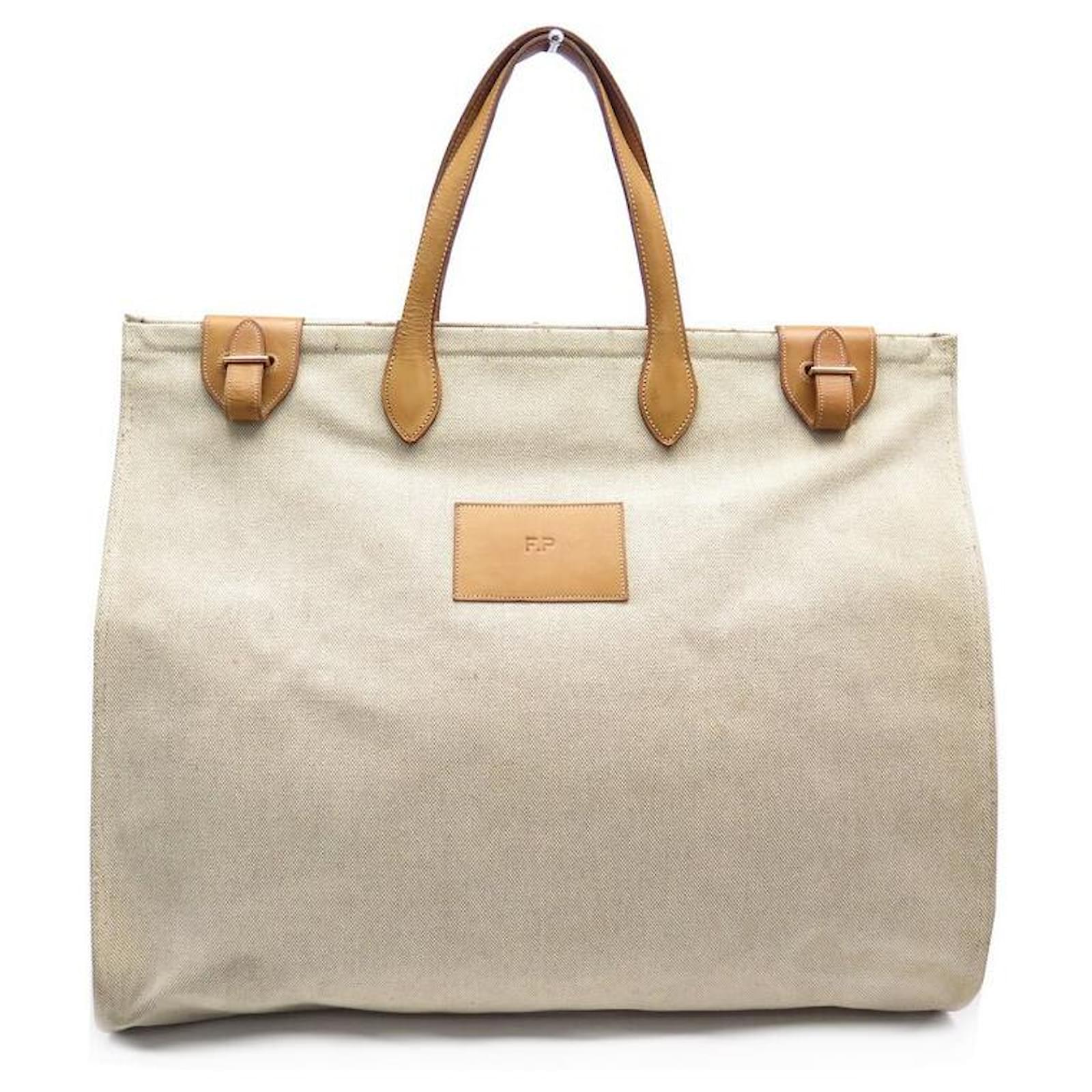 Hermès VINTAGE HERMES TRAVEL HANDBAG IN CANVAS & BEIGE LEATHER