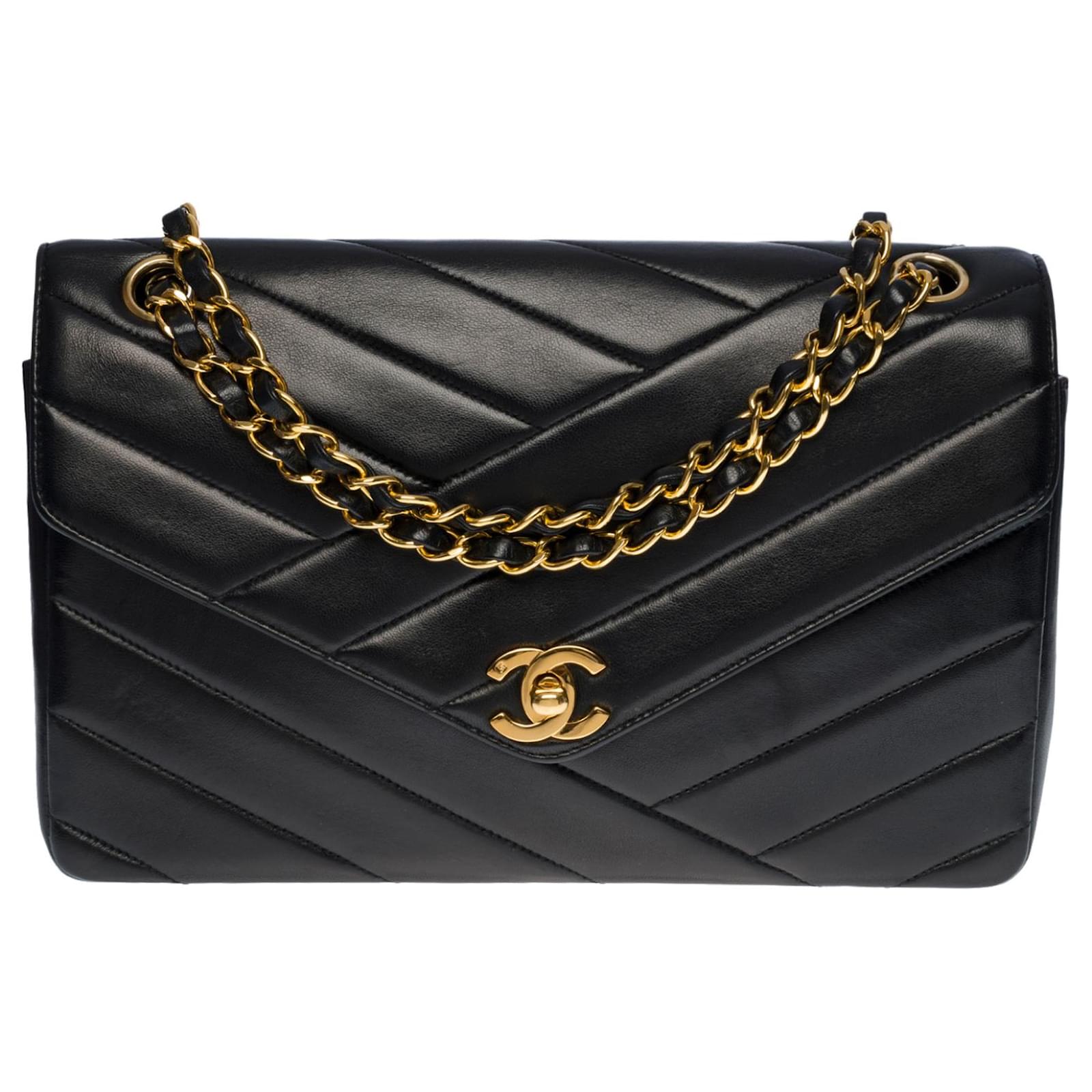 Timeless Beautiful Chanel Classique Flap bag handbag in black herringbone quilted  lambskin, garniture en métal doré Leather ref.495303 - Joli Closet