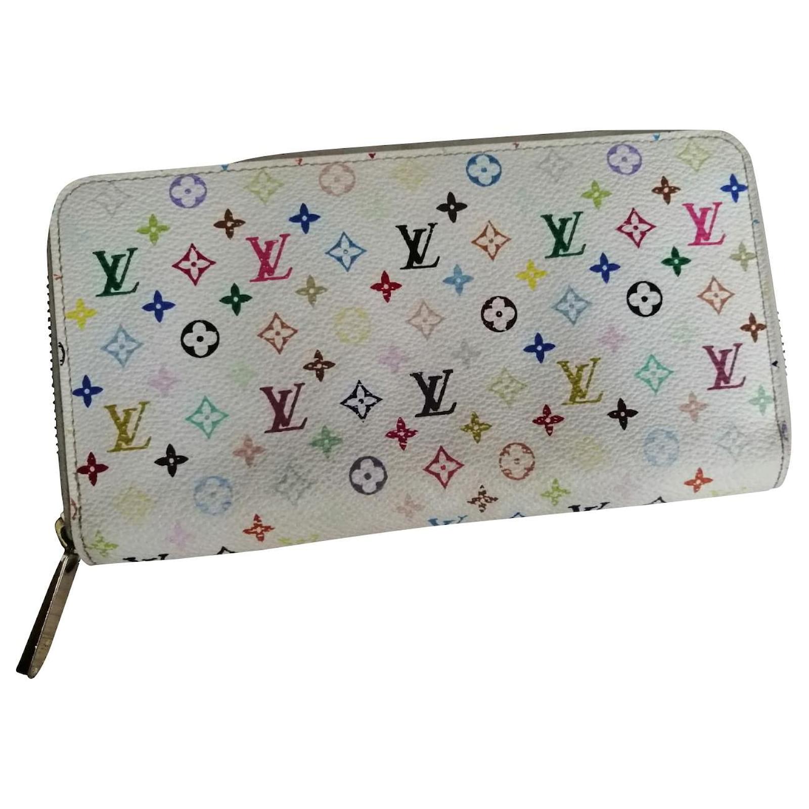 LOUIS VUITTON Cartera Zippy en lona con monograma. …