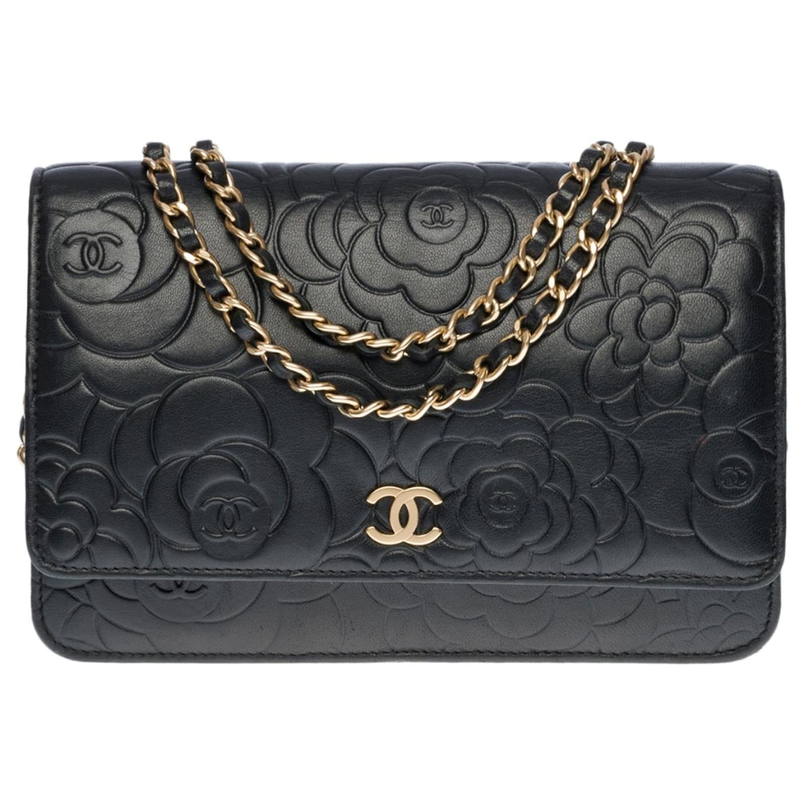 Beautiful Chanel Wallet On Chain bag in black Camellia leather ...