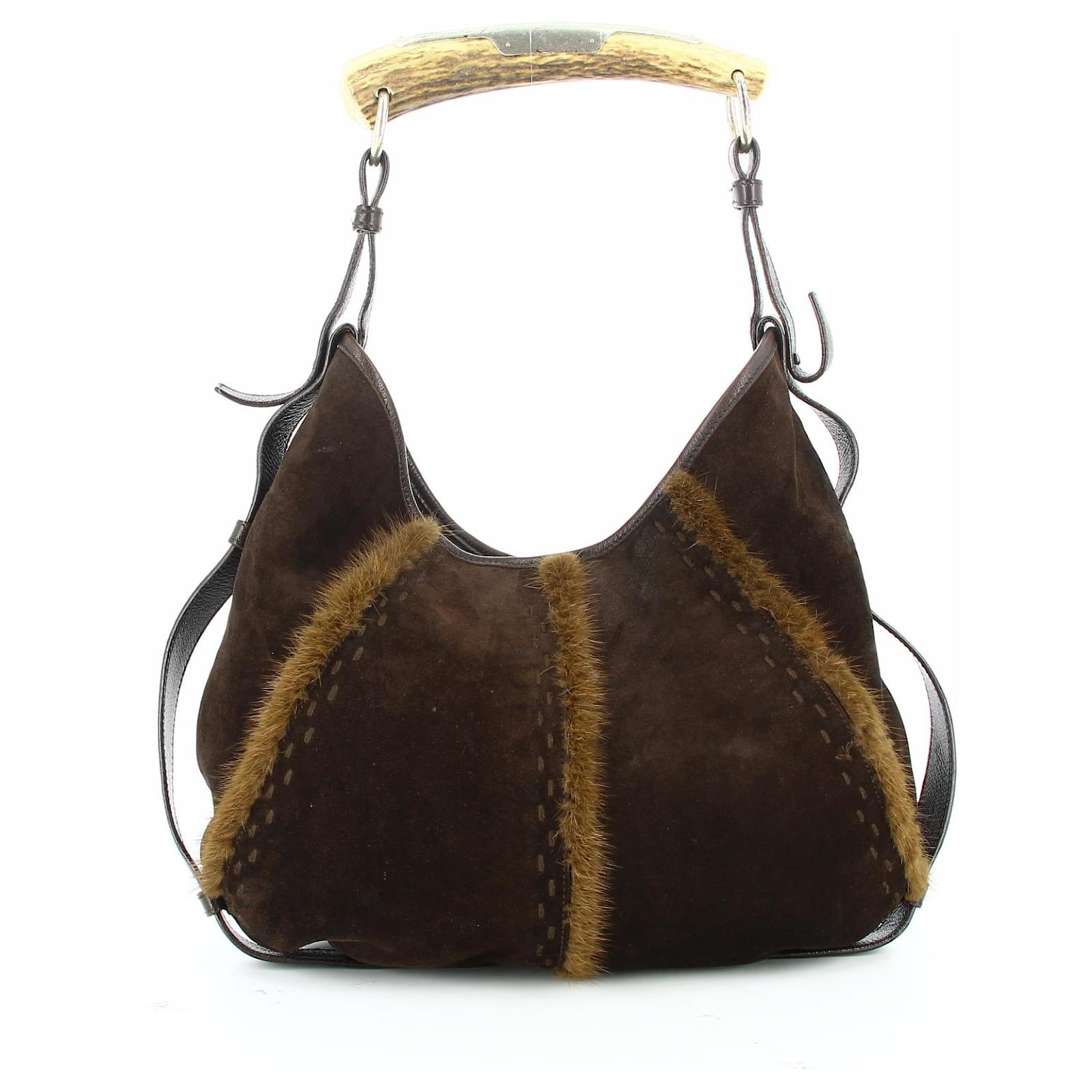 Yves Saint Laurent Mombasa Bag  Yves saint laurent, Brown leather handbags,  Leather handbags