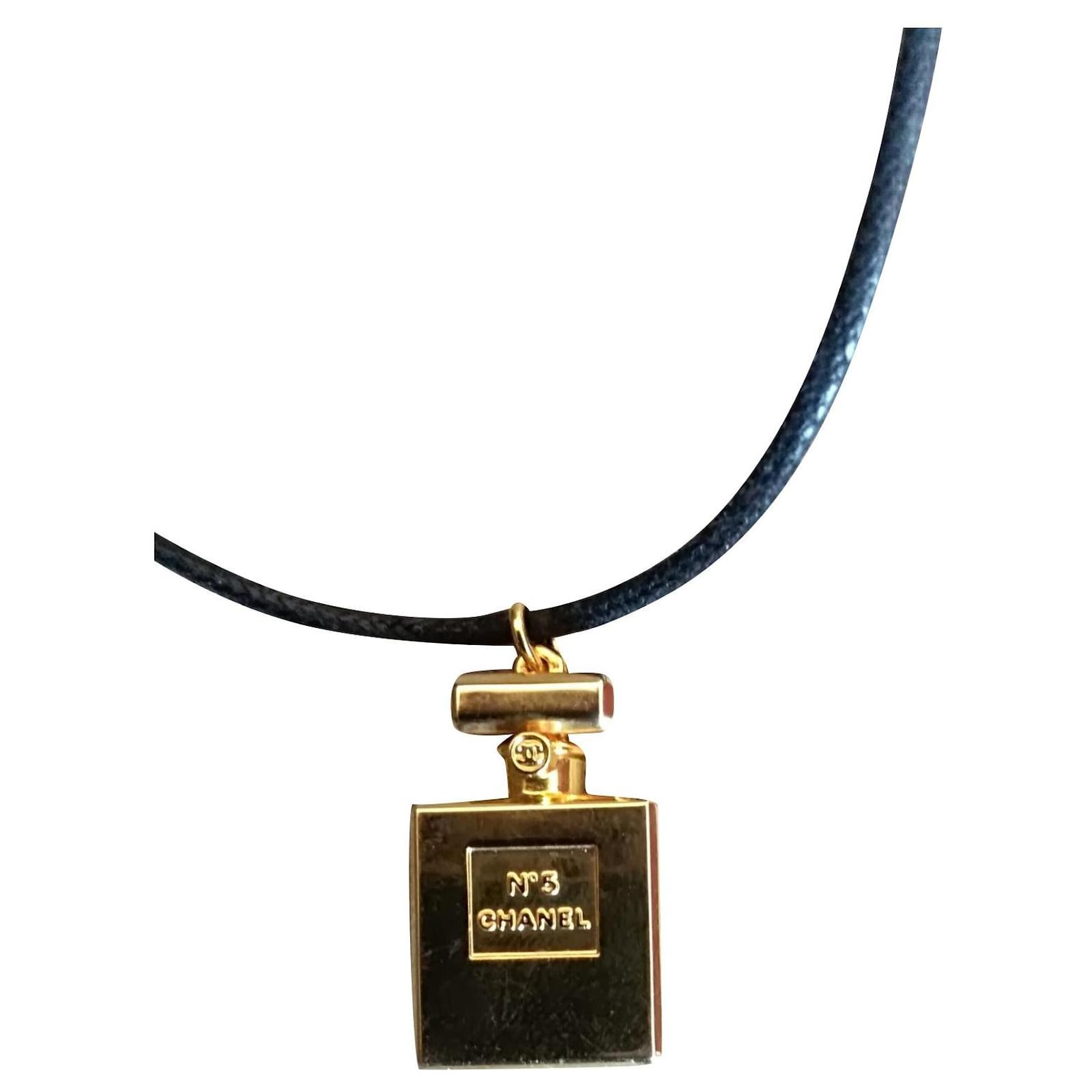 Chanel Gold Chanel No5 Perfume Bottle Necklace Black Golden Metal  ref306304  Joli Closet