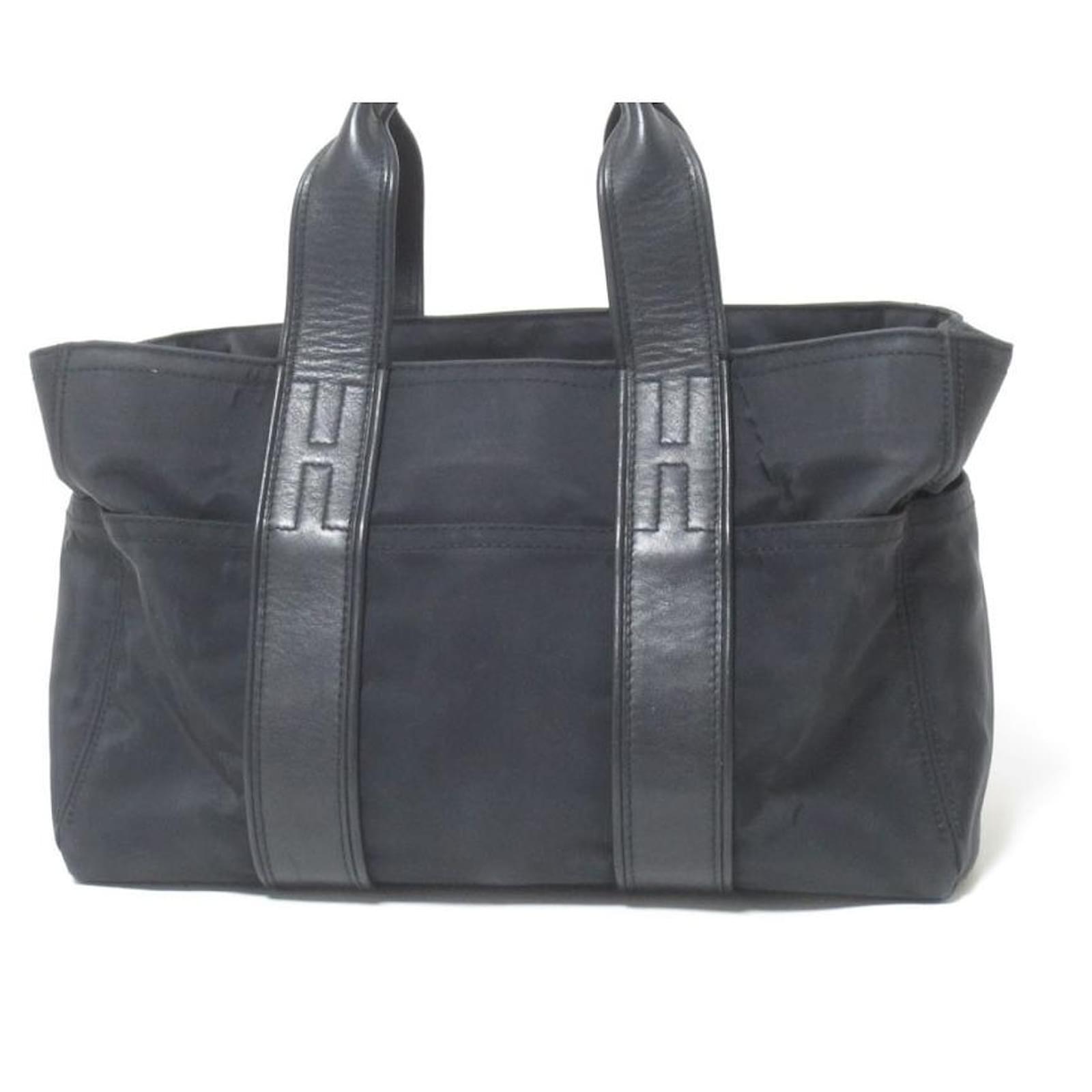 Hermès [Usado] HERMES Bolso Hermes Acapulco PM Bolso Negro Nylon Cuero  ref.517810 - Joli Closet