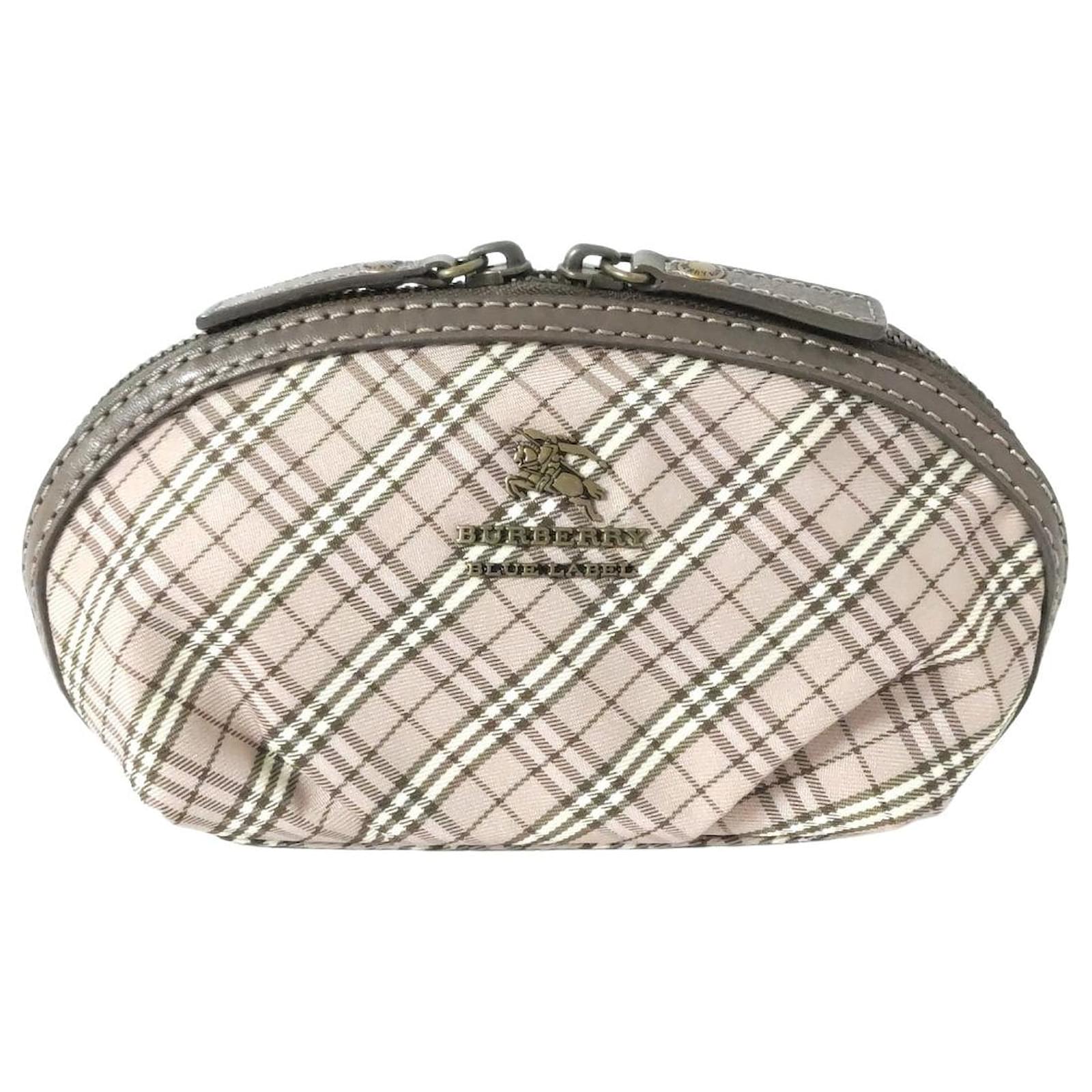 Burberry Clutch in Beige - Second hand Burberry Clutch in Beige acquista di  seconda mano a 210€ (3739616)