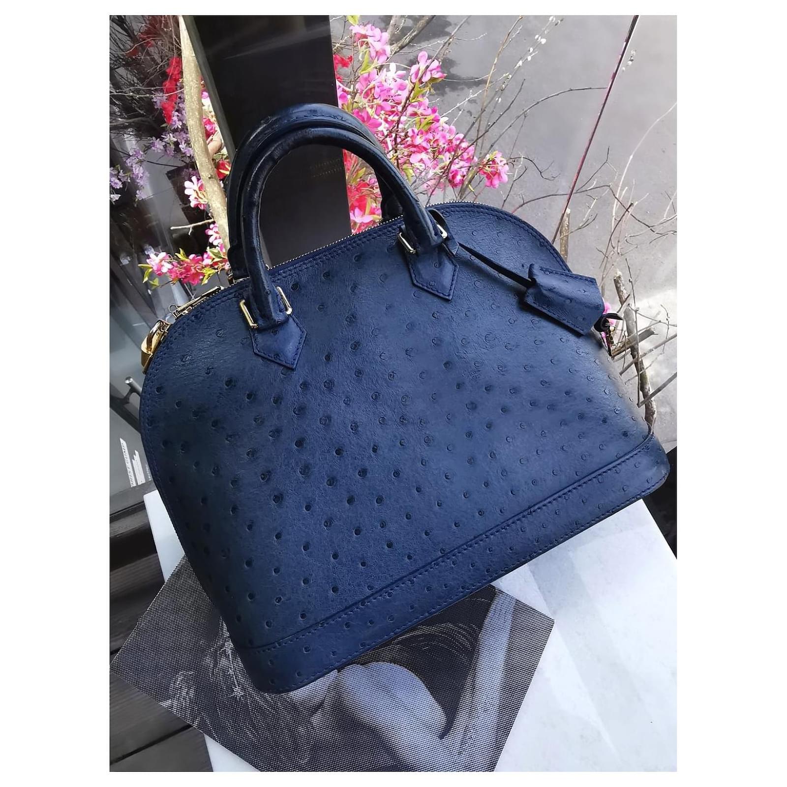 lv bag with blue strap