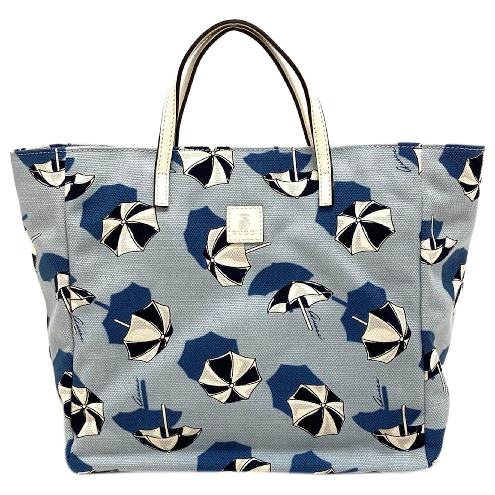 Mini leather-trimmed printed canvas tote
