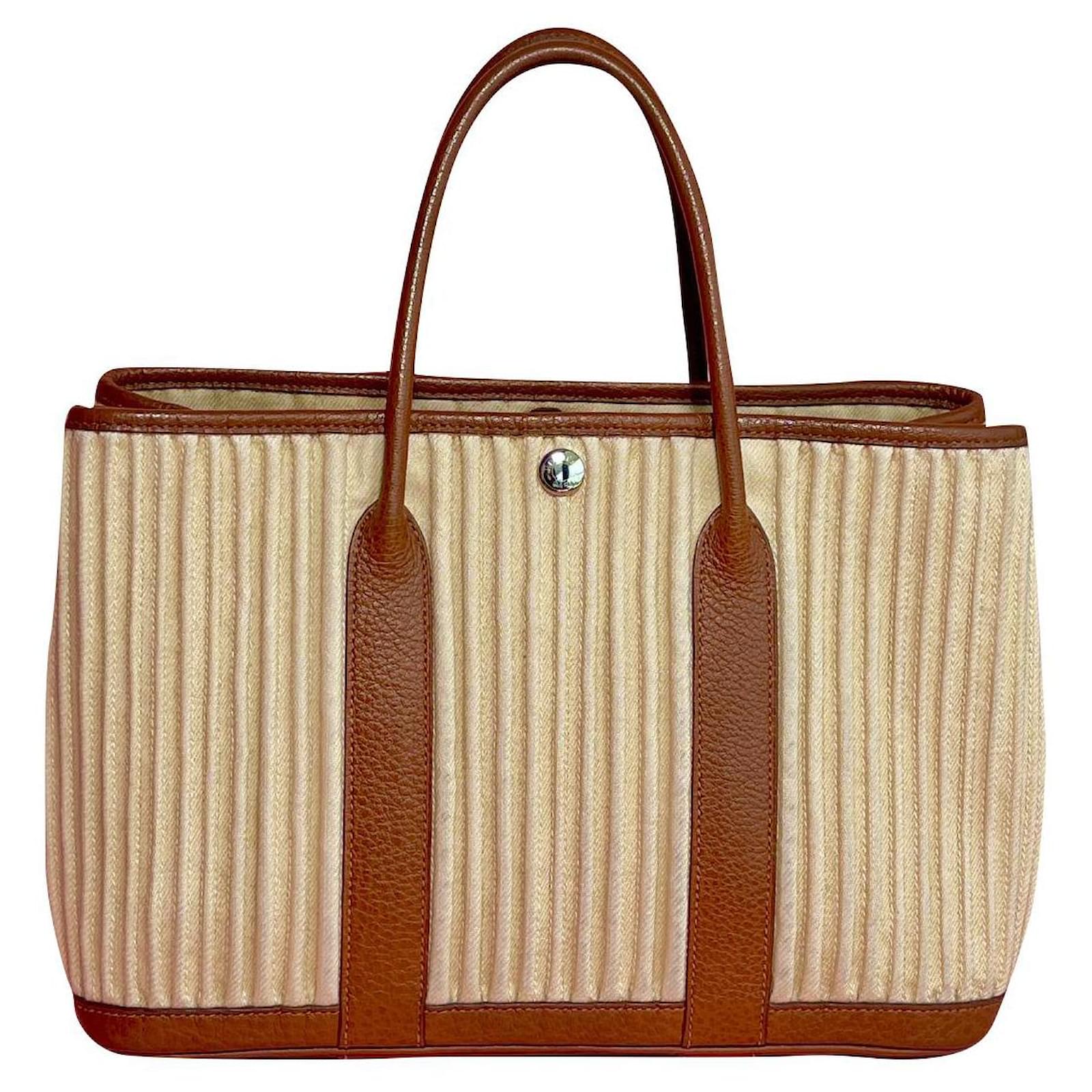 Rare vintage PM Hermès Garden Party size 30 cm in beige wool and golden  buffalo leather.