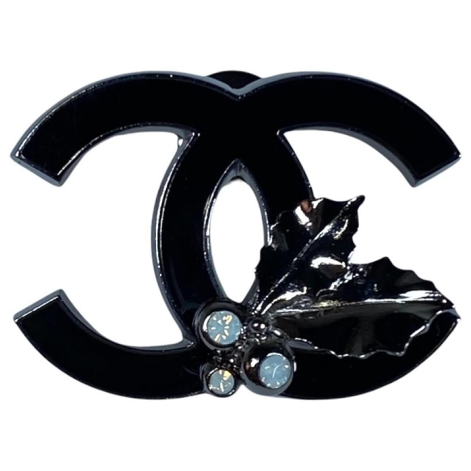 coco chanel brooch logo
