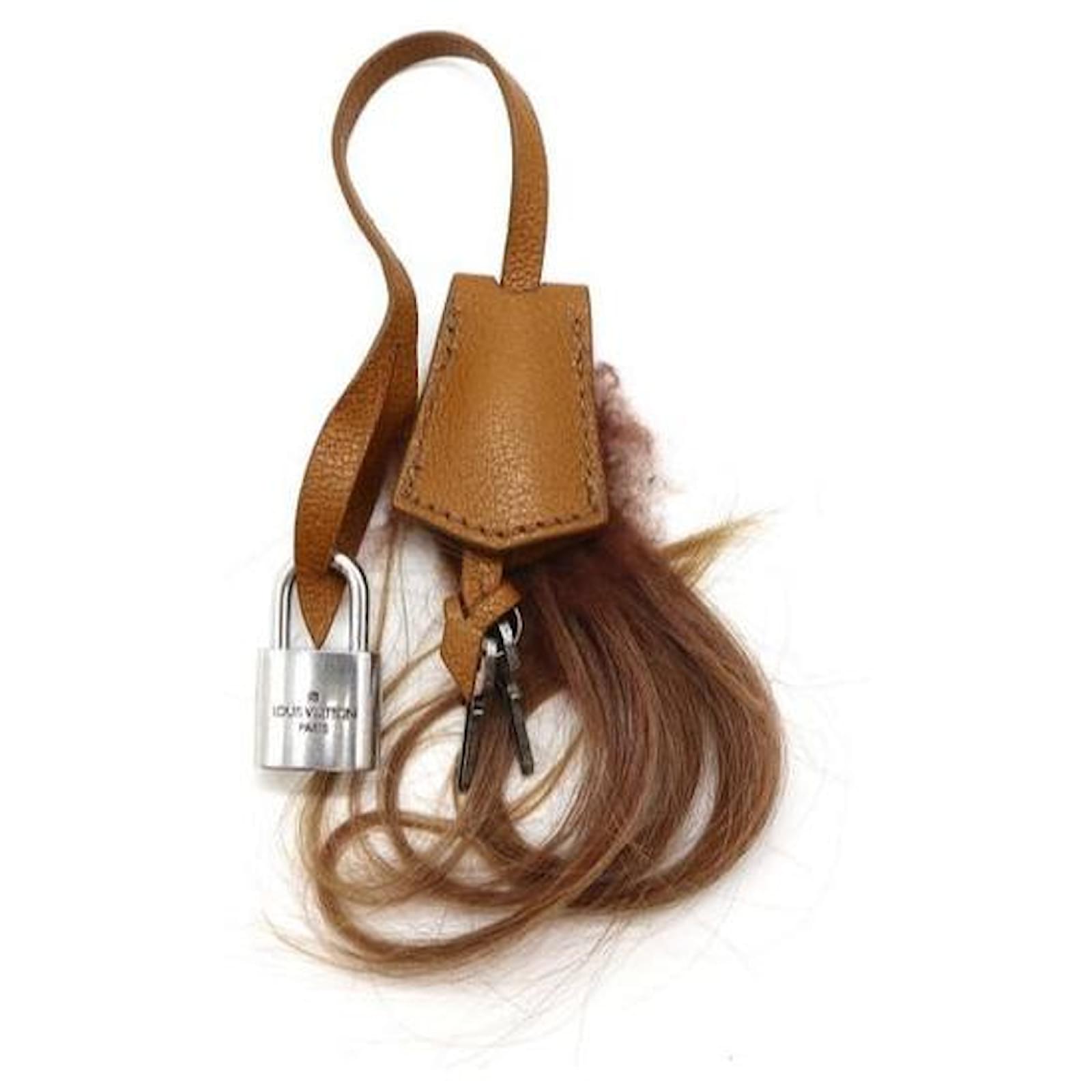 Louis Vuitton Brown Transsiberian Goat Hair Clochette Lock and