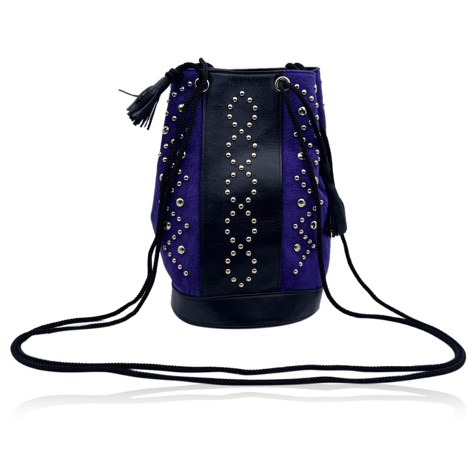 Saint Laurent Monogram All Over Bucket Bag In Studded Suede in