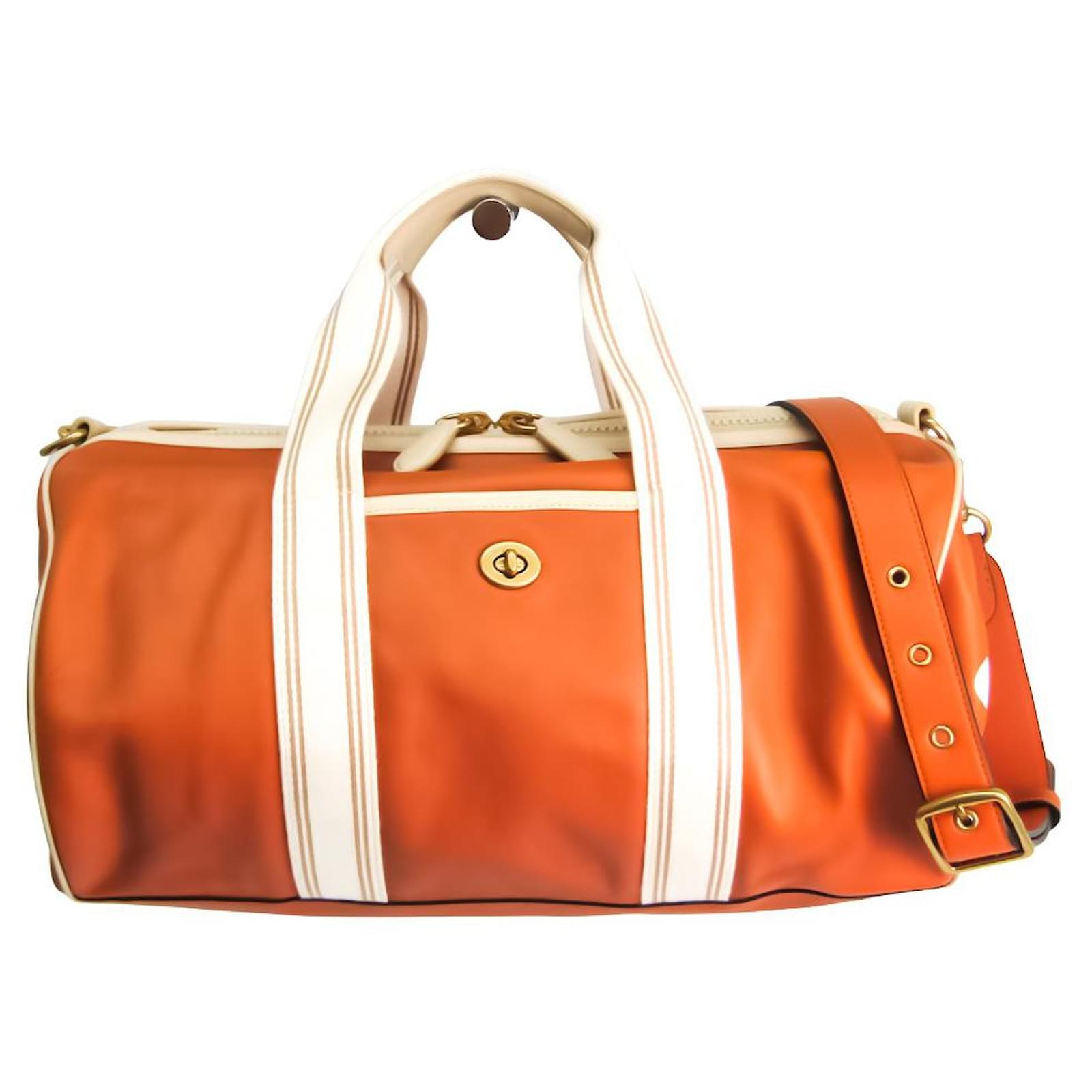 Coach Travel bag Orange Leather  - Joli Closet