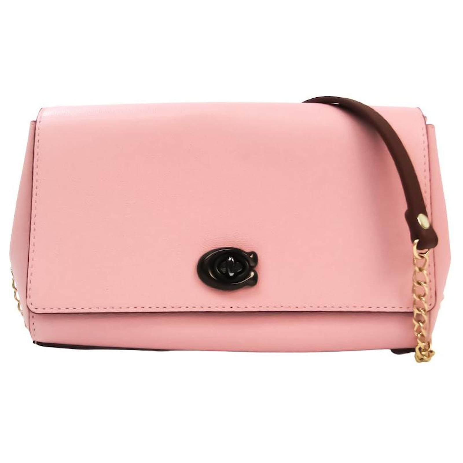 Coach on sale dinky pink