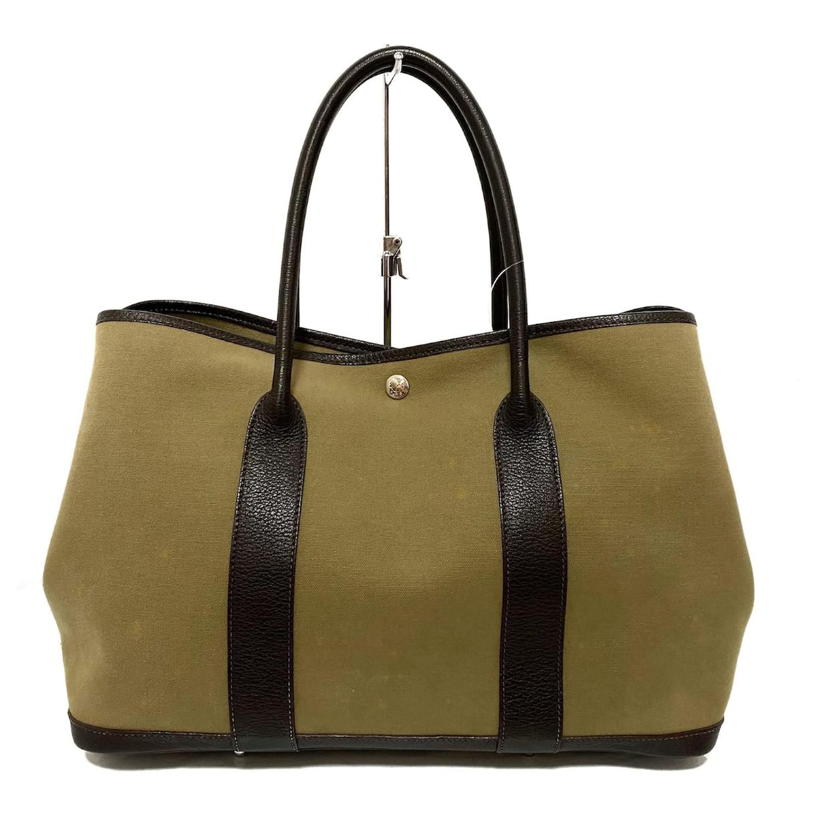 HERMES Garden party bag in khaki canvas and leather two-tone