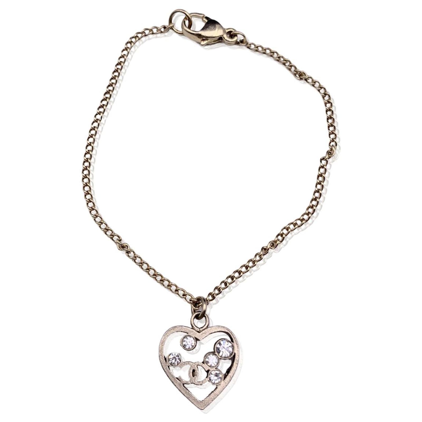 Chanel Karl Lagerfeld Silver Chain Bracelet with CC Heart Charm Silvery  Metal ref.569902 - Joli Closet