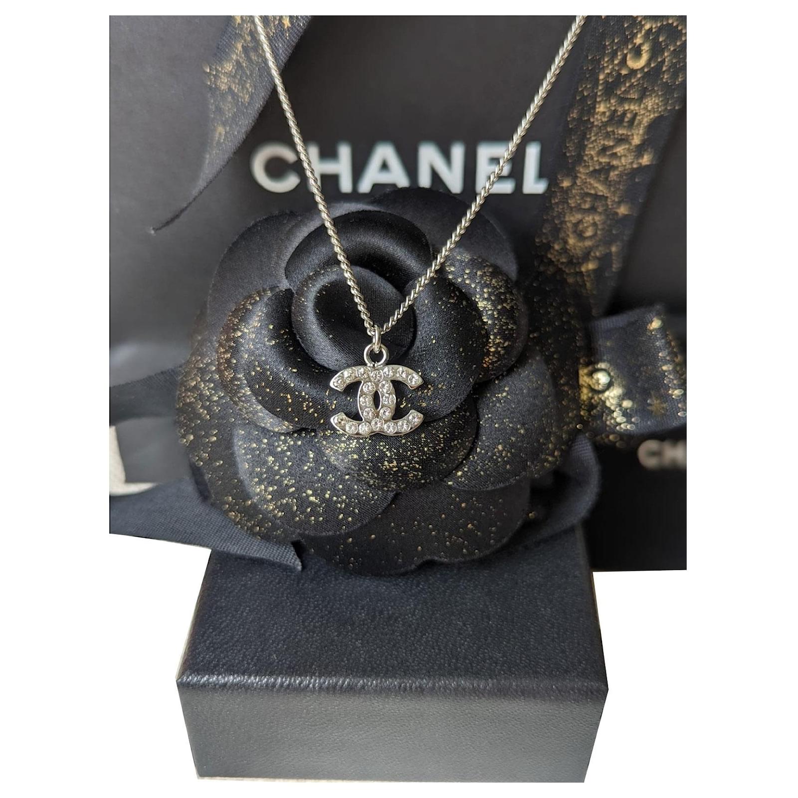 Chanel CC B12V logo classic timeless crystal necklace box docs Silvery  Metal ref.572301 - Joli Closet