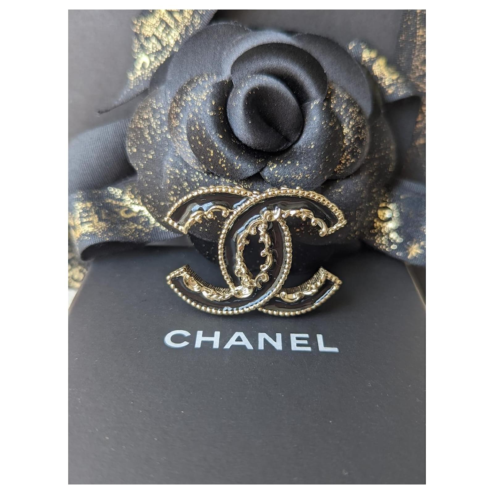 black chanel brooch
