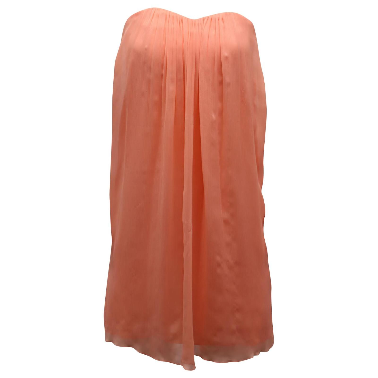 Alice + Olivia Strapless Dress in Peach Polyester ref.597345 - Joli Closet