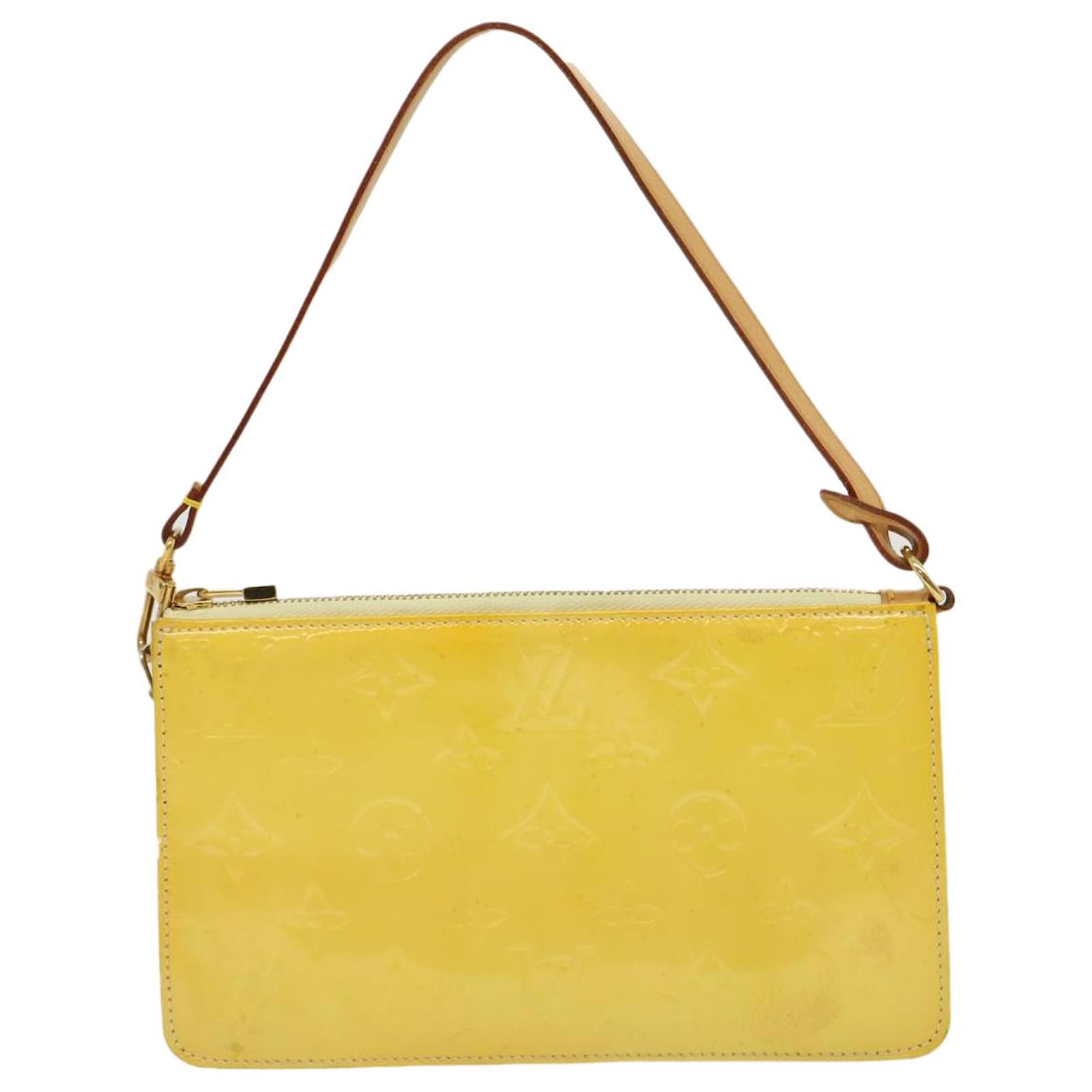 Lexington patent leather handbag Louis Vuitton Yellow in Patent