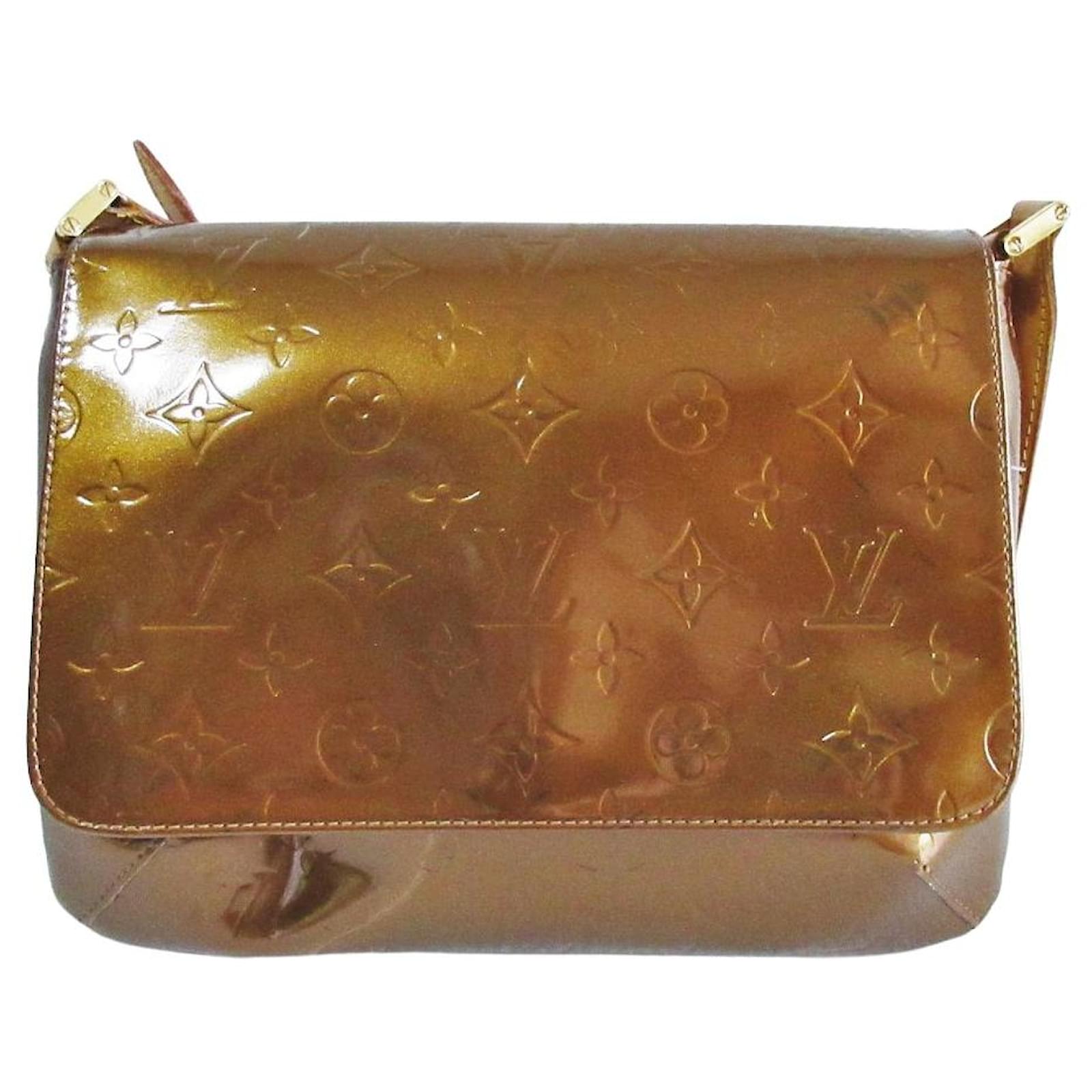 Thompson patent leather handbag Louis Vuitton Gold in Patent