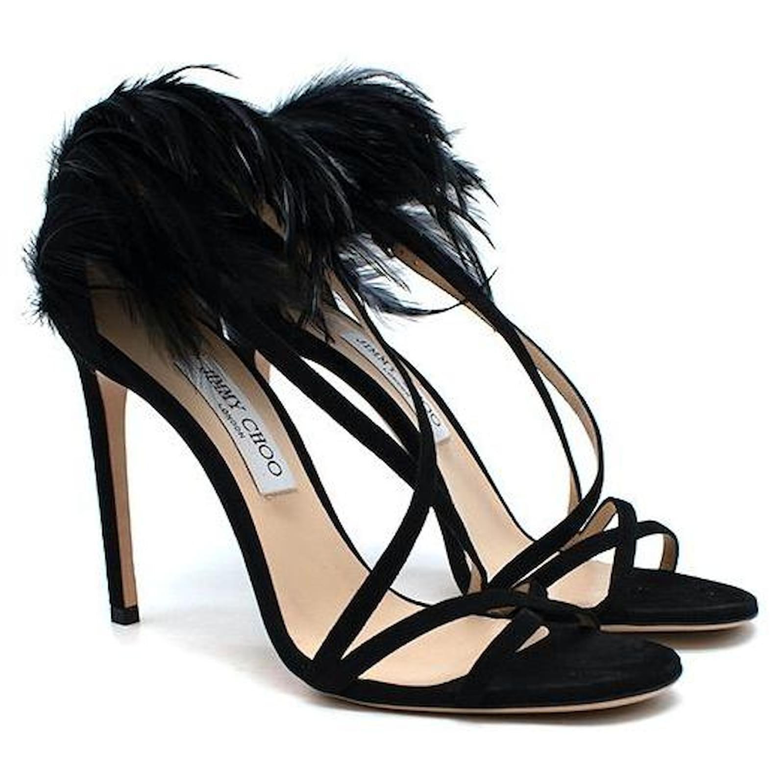 Feathers... - Jimmy Choos & Tennis Shoes