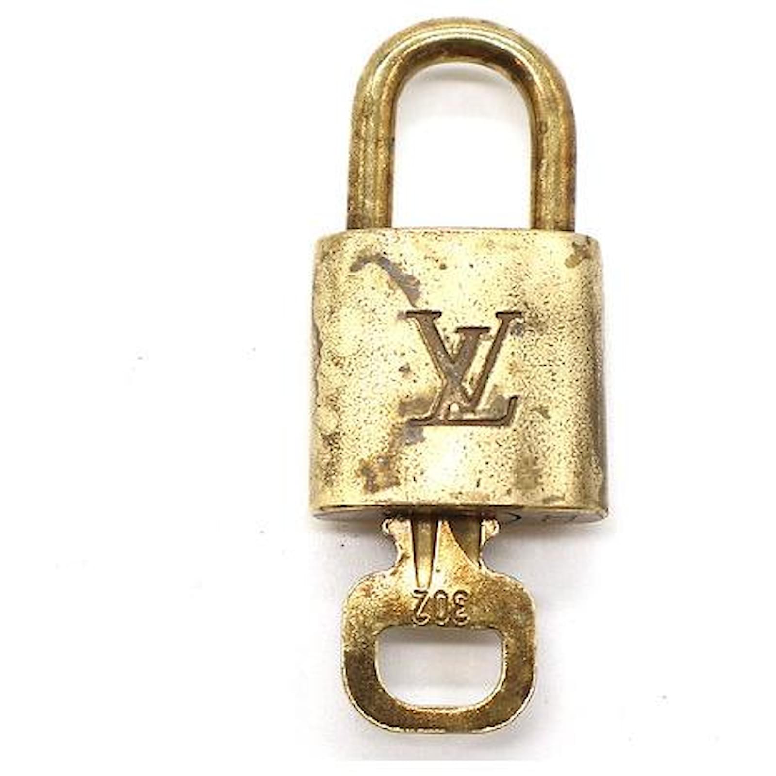 Authentic pre-owned Louis Vuitton lock & key set