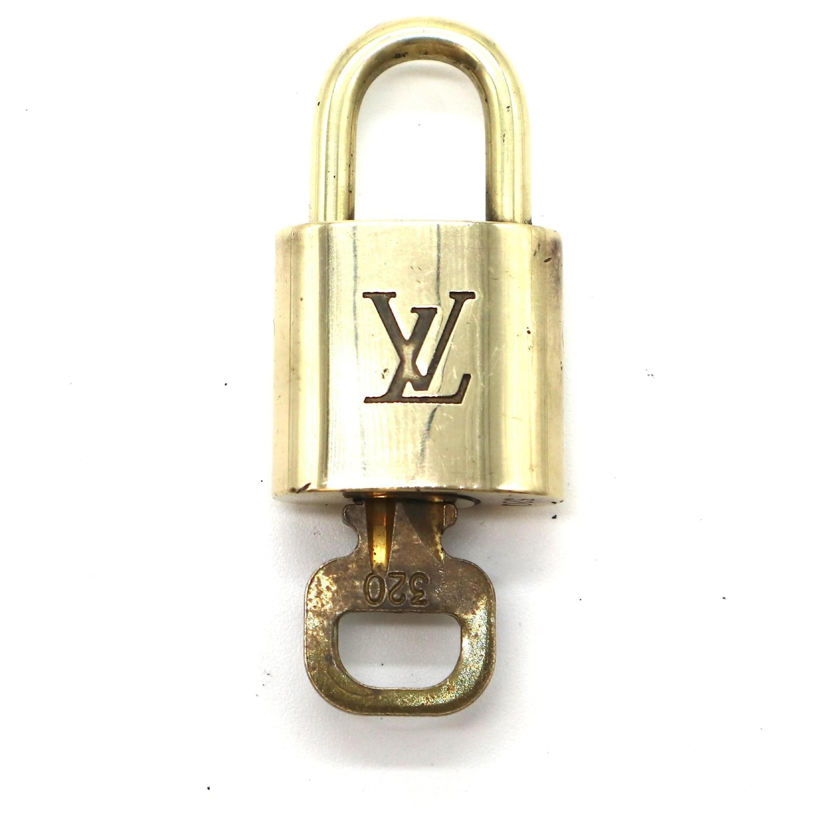 Authentic Louis Vuitton lock and key set #320 Gold Hardware