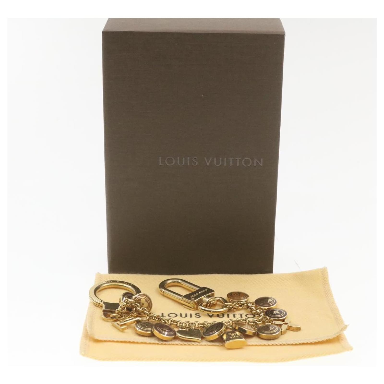 LOUIS VUITTON Porte Cles Chainne Pastille Bag Charm Gold M65386 LV Auth  am1035g Golden Metal ref.633431 - Joli Closet
