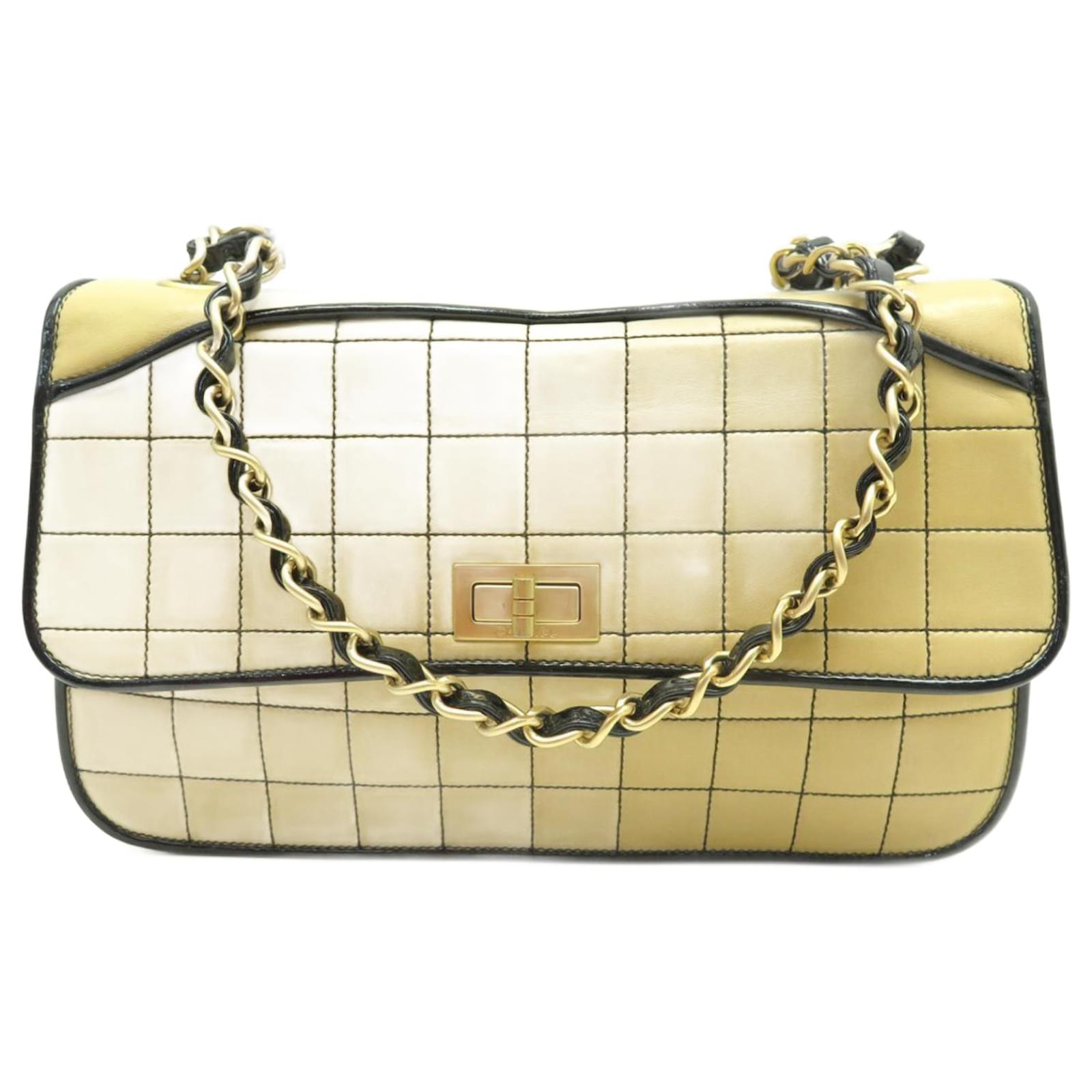 Vintage Chanel Chocolate Bar Flap Bag from 2000-2002