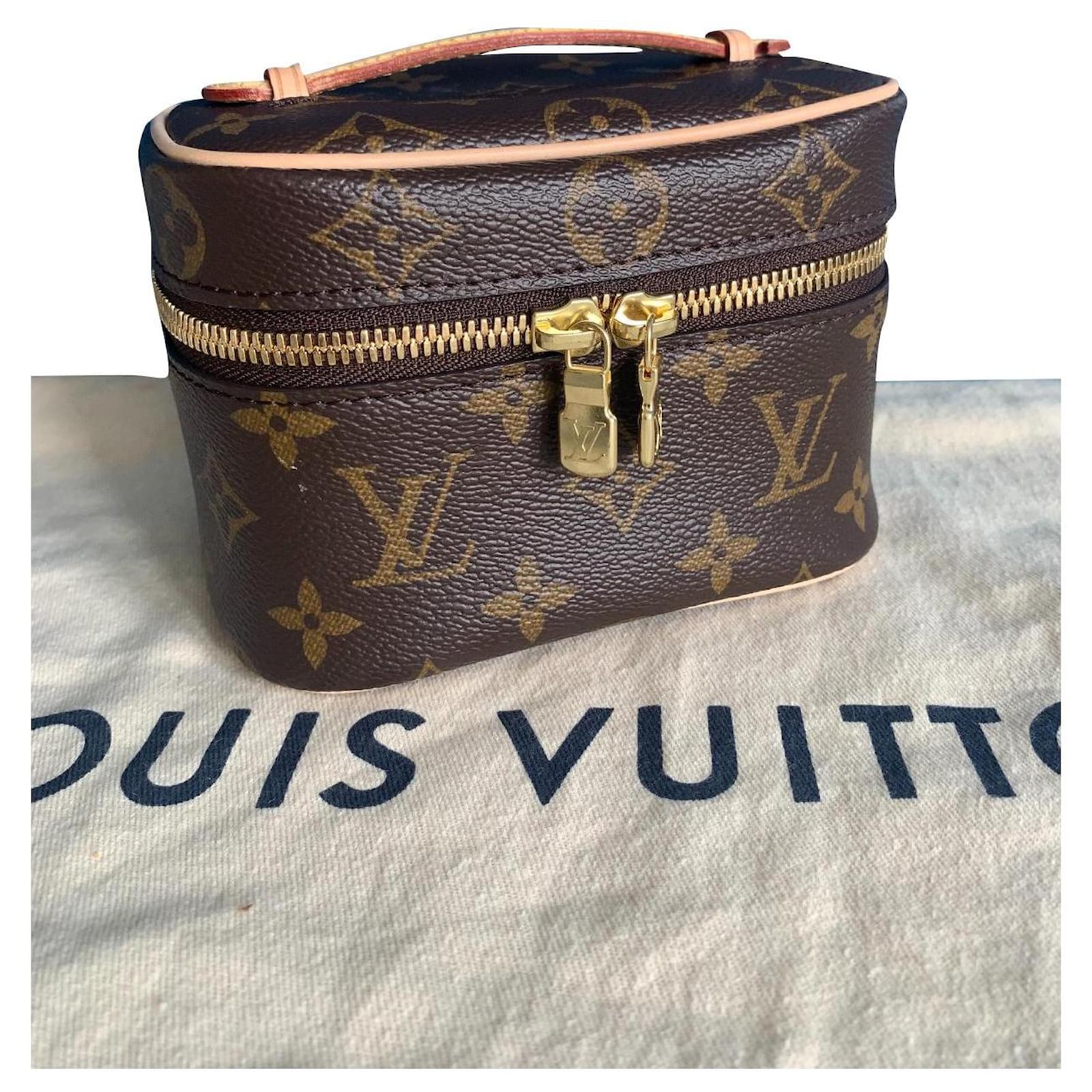 Trousse de toilette cloth vanity case Louis Vuitton Brown in Cloth