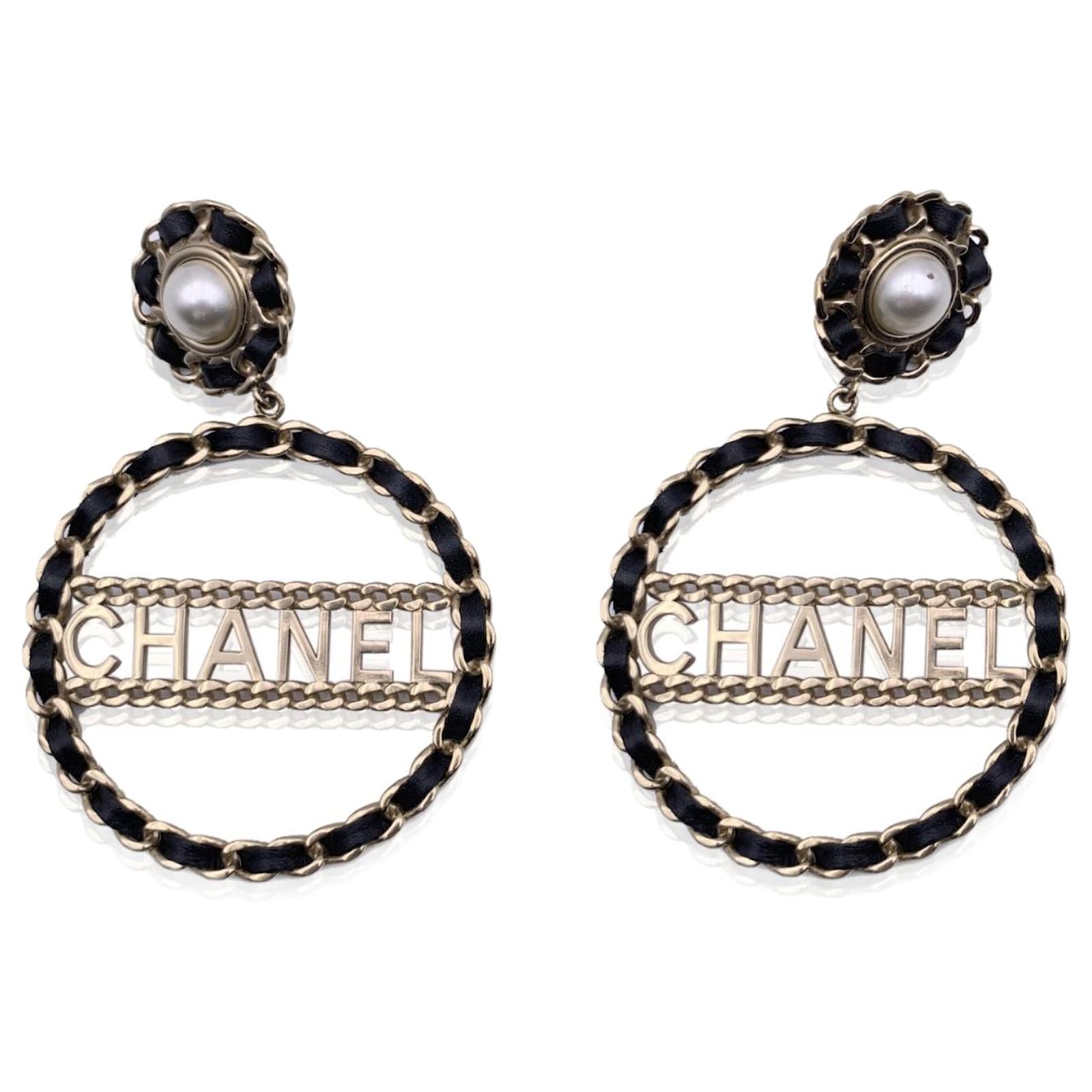 Chanel Gold Metal and Black Leather Chain Logo Hoop Clip On Earrings Golden  ref.692562 - Joli Closet