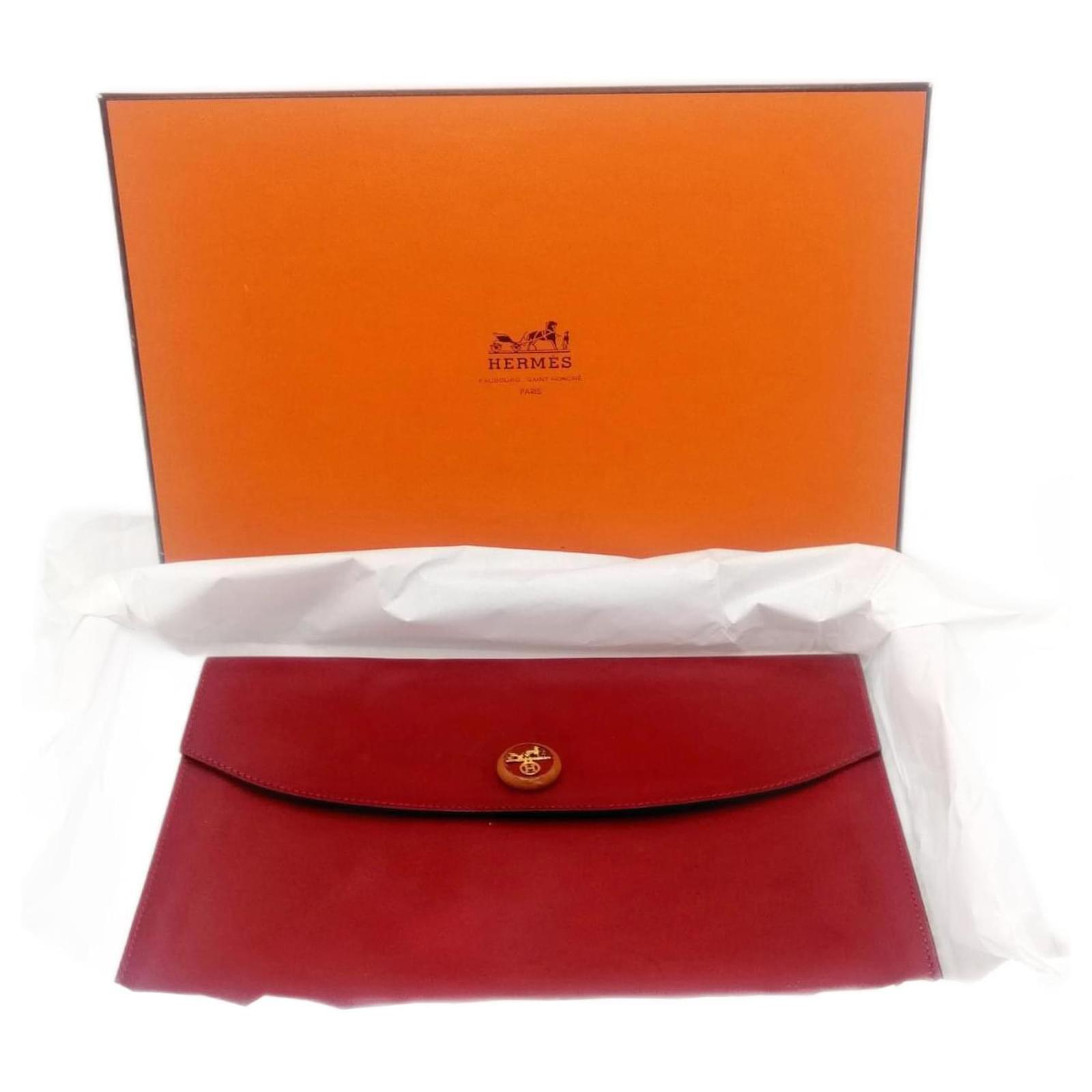 Sold at Auction: A HERMES RIO CLUTCH BAG