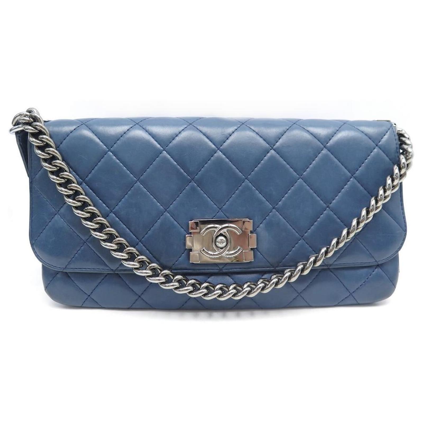 The Global Luxury Closet   Chanel Series 22 Cobalt Blue Calf Skin  Chevron Ruthenium hardware Old Medium Boy bag Condition Kept unused  immaculate condition  Comes with Box Dust bag