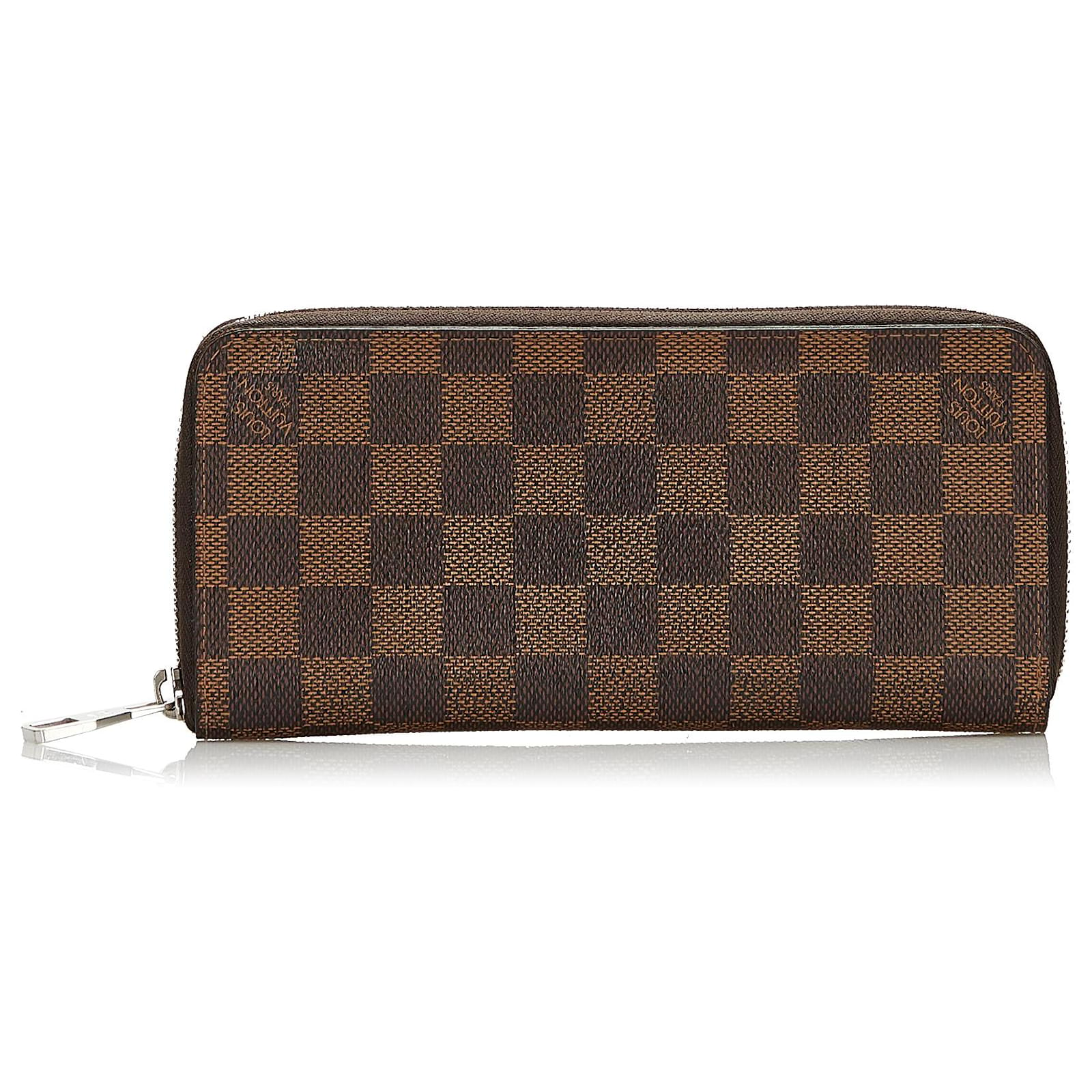 Louis Vuitton Damier Ebene Zippy Vertical Wallet Brown Cloth ref.603793 -  Joli Closet