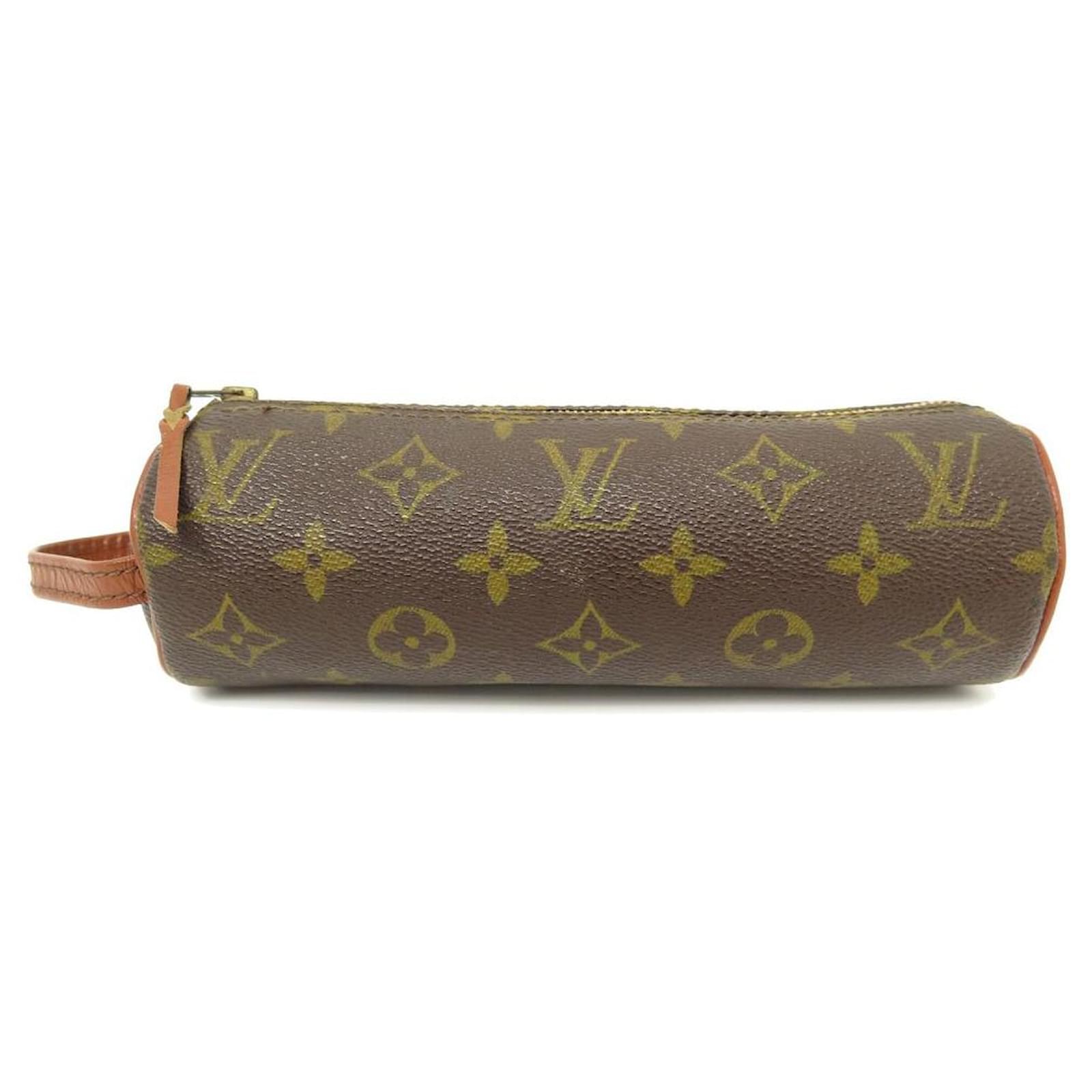 A Louis Vuitton Monogram Canvas and Leather Golf Bag by Louis