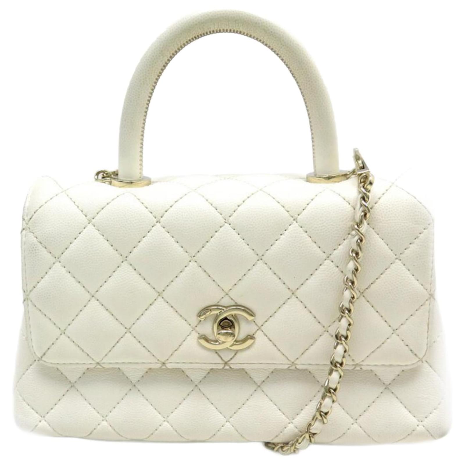 CHANEL COCO HANDLE PM BAG IN WHITE QUILTED CAVIAR LEATHER HAND BAG  ref.728517 - Joli Closet
