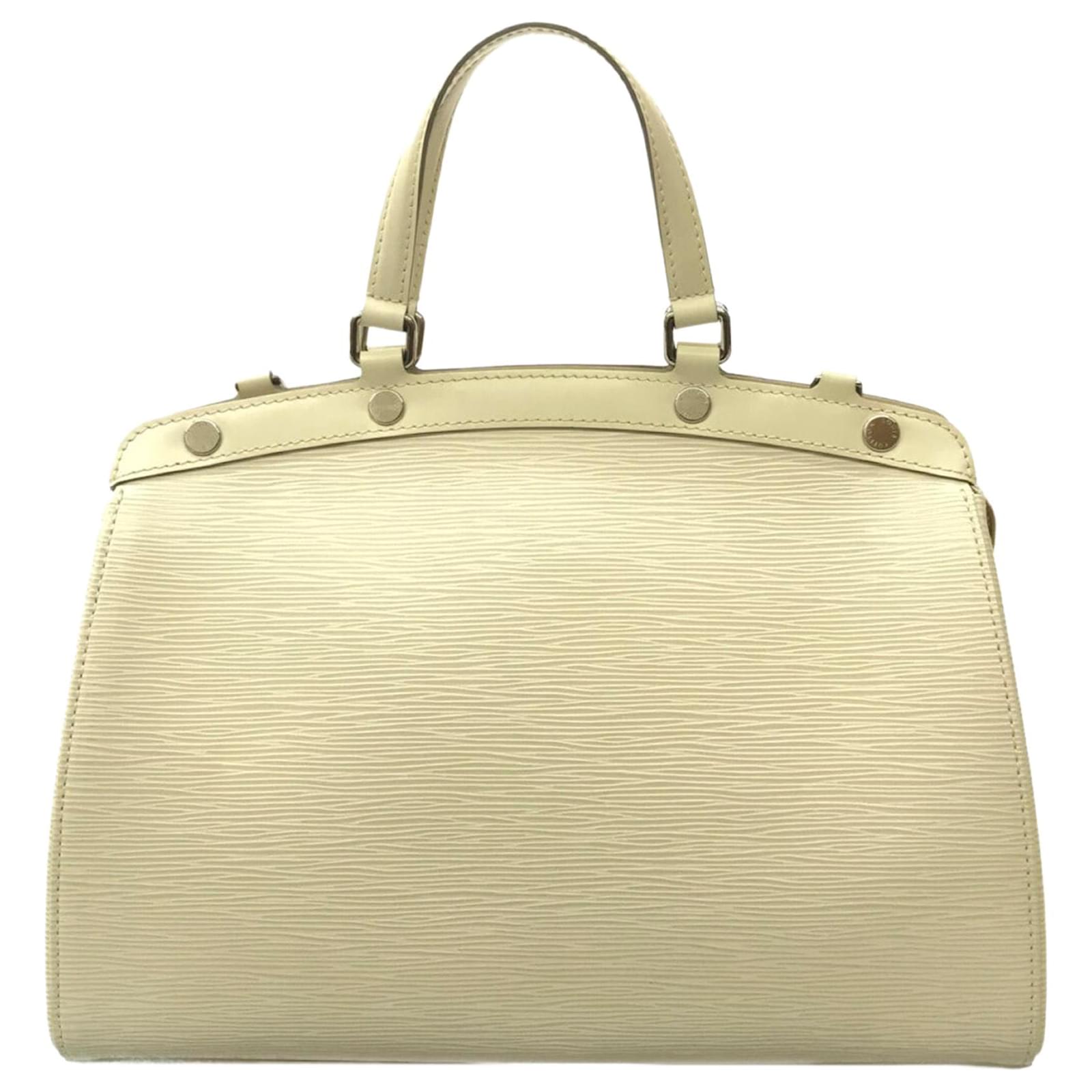 white and cream louis vuittons handbags