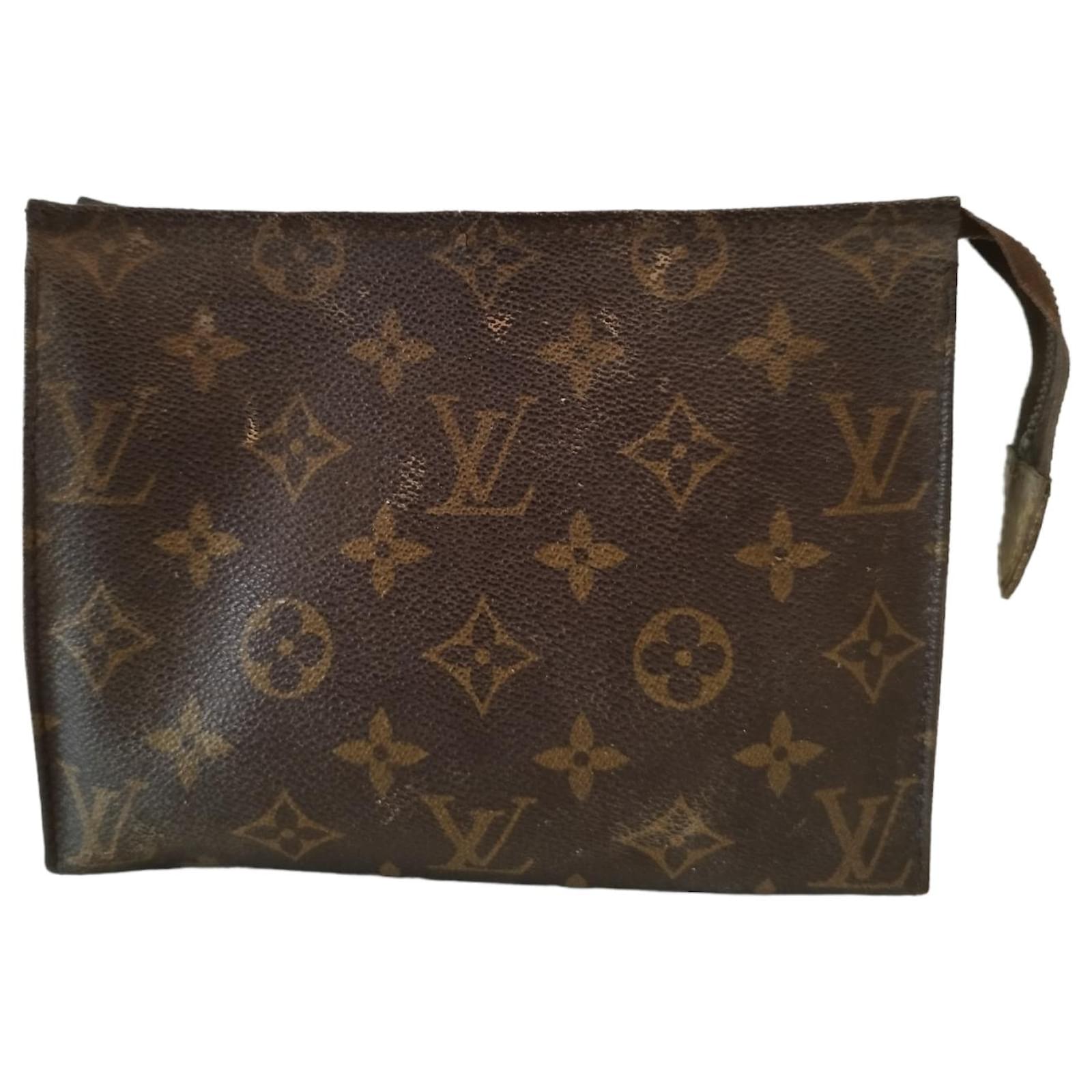Louis Vuitton Trousse de Toilette Brown Canvas Clutch Bag (Pre-Owned)