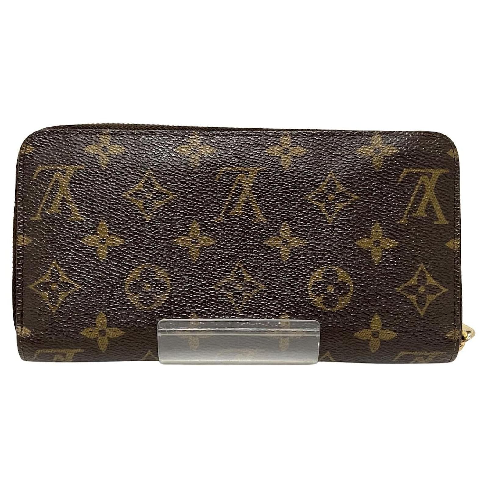 Louis Vuitton Portefeuille zippy Brown Cloth ref.971875 - Joli Closet