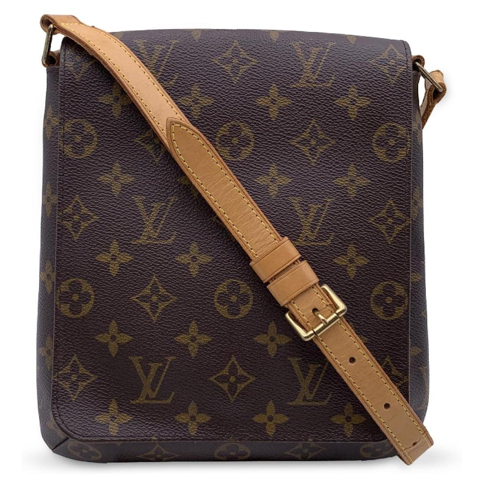 Bolsa saco vintage Louis Vuitton. Apresenta desgastes d