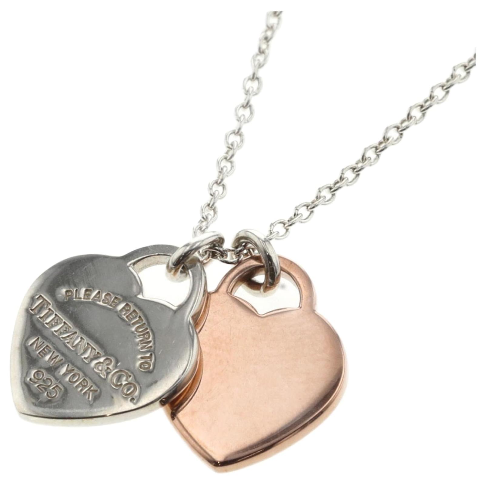 Return to Tiffany® mini double heart tag pendant in 18k gold. | Tiffany &  Co.