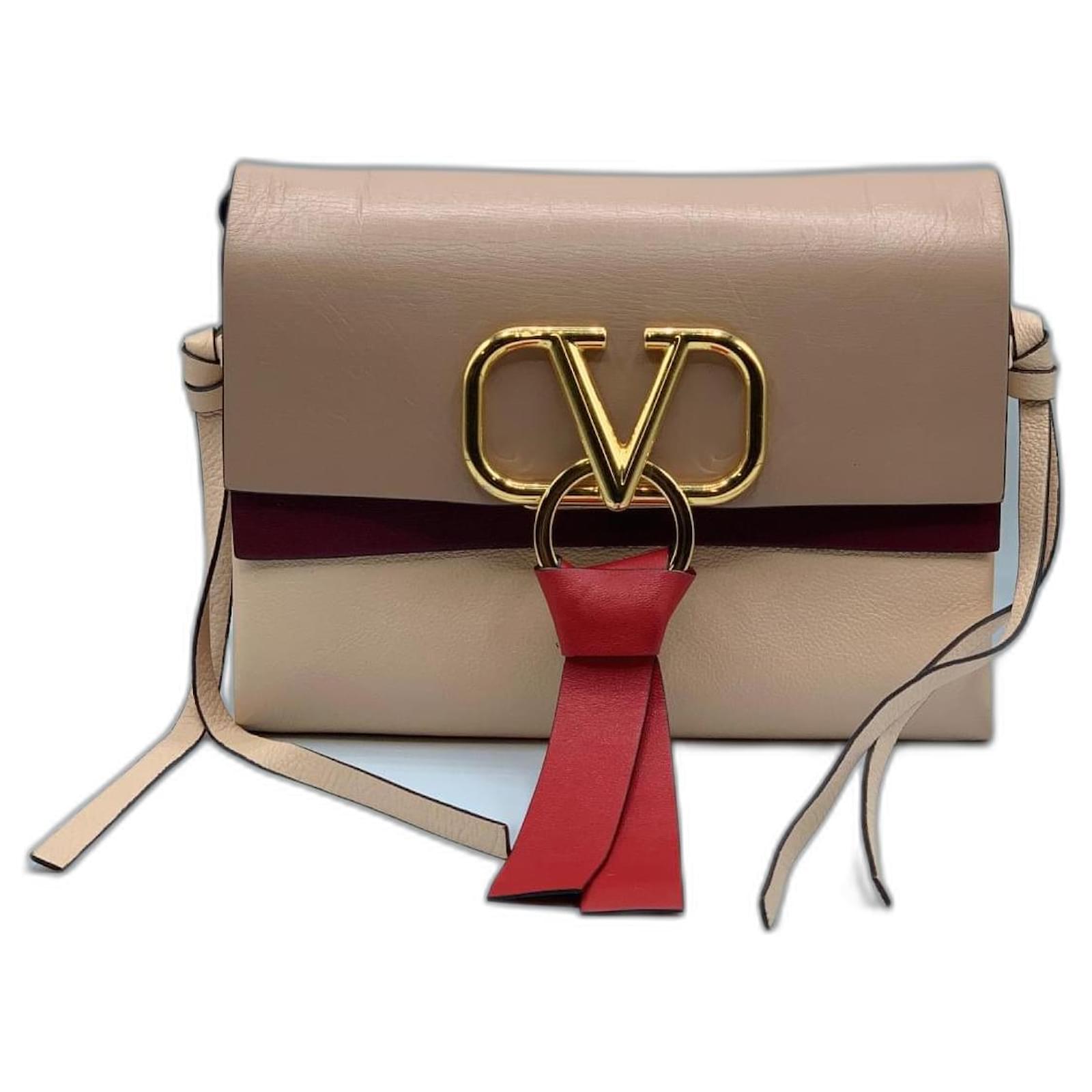 Valentino Garavani Handbags Beige Dark red Leather ref.806621 - Joli Closet
