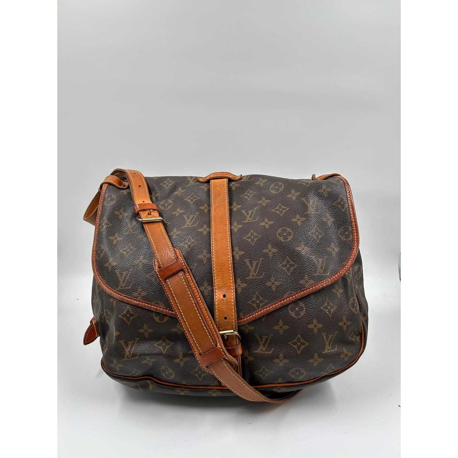 Buy Louis Vuitton Preloved LOUIS VUITTON Saumur 35 monogram Shoulder bag  PVC leather Brown 2023 Online  ZALORA Singapore